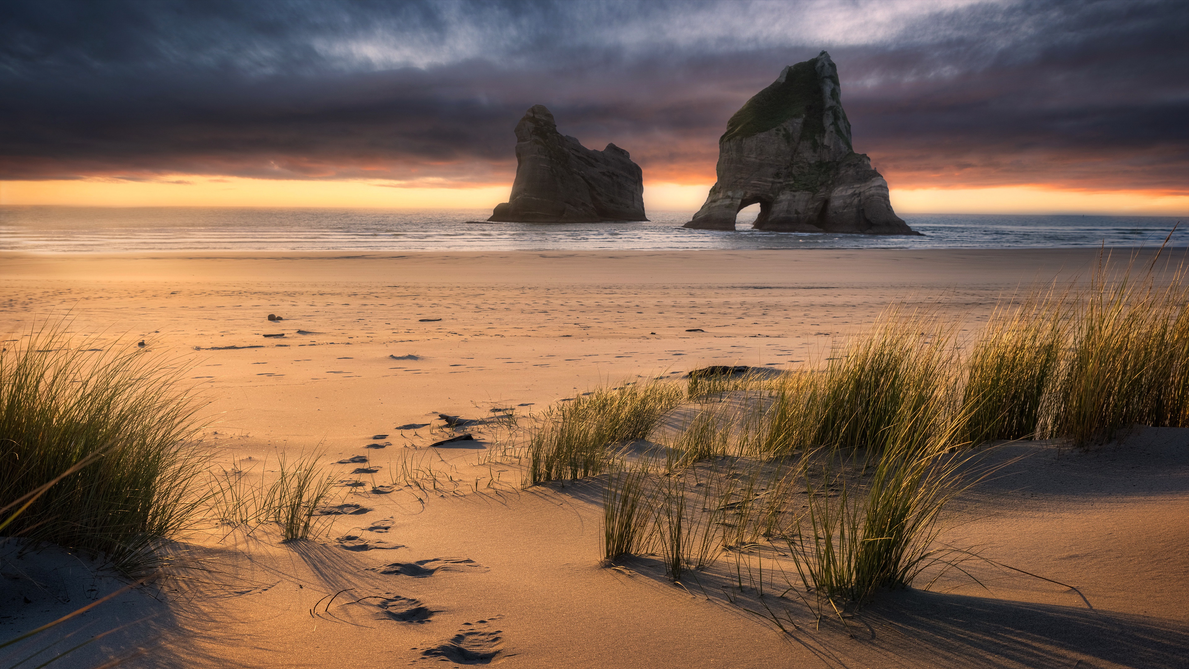 Free download wallpaper Nature, Sunset, Beach, Sand, Horizon, New Zealand, Earth, Arch on your PC desktop