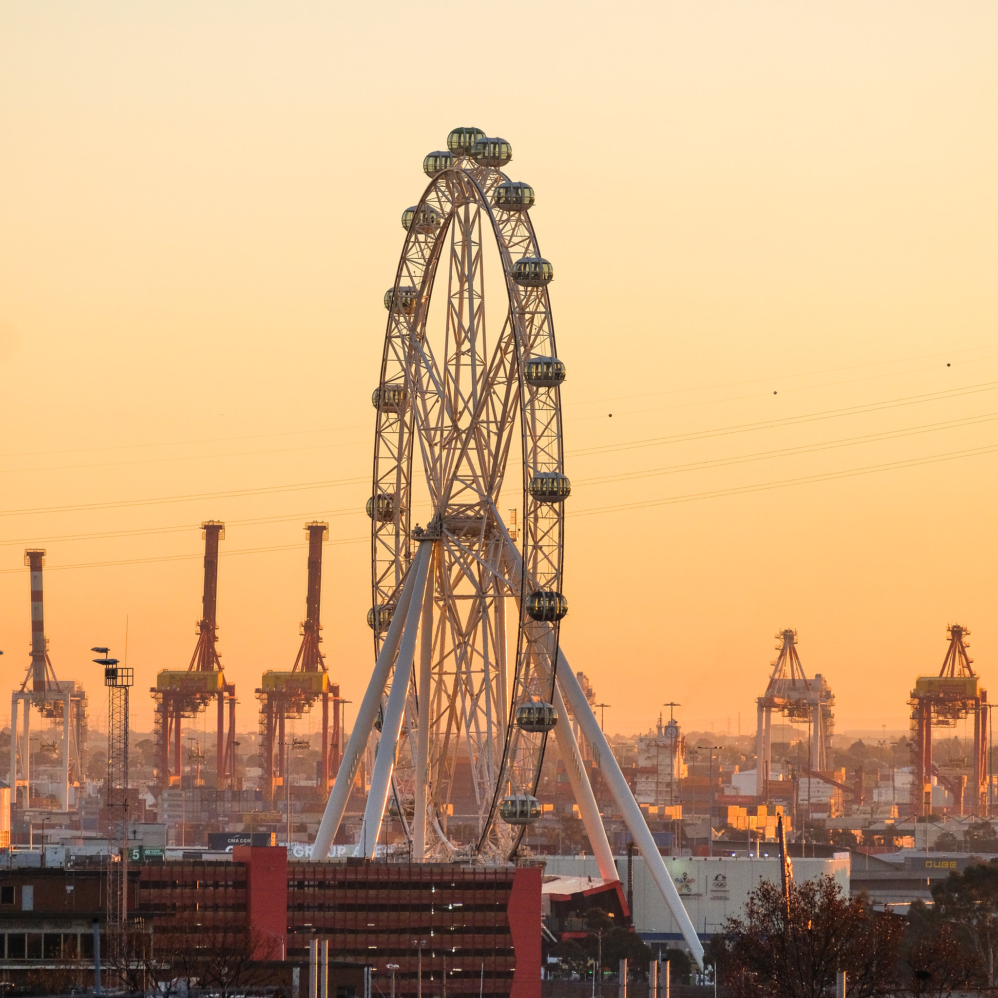 cities, sunset, city, ferris wheel, attraction, port High Definition image