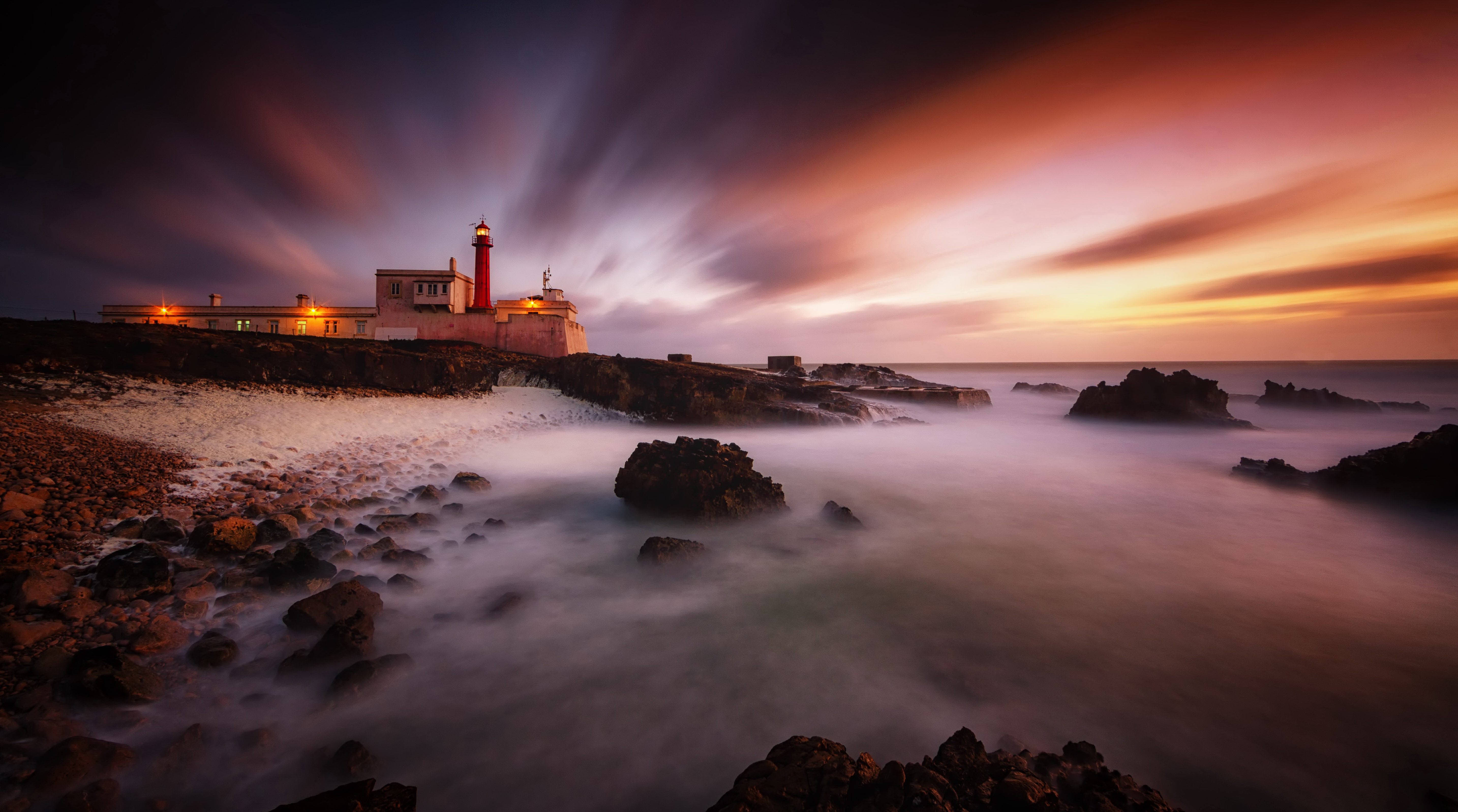 Free download wallpaper Sunset, Lighthouse, Portugal, Man Made on your PC desktop
