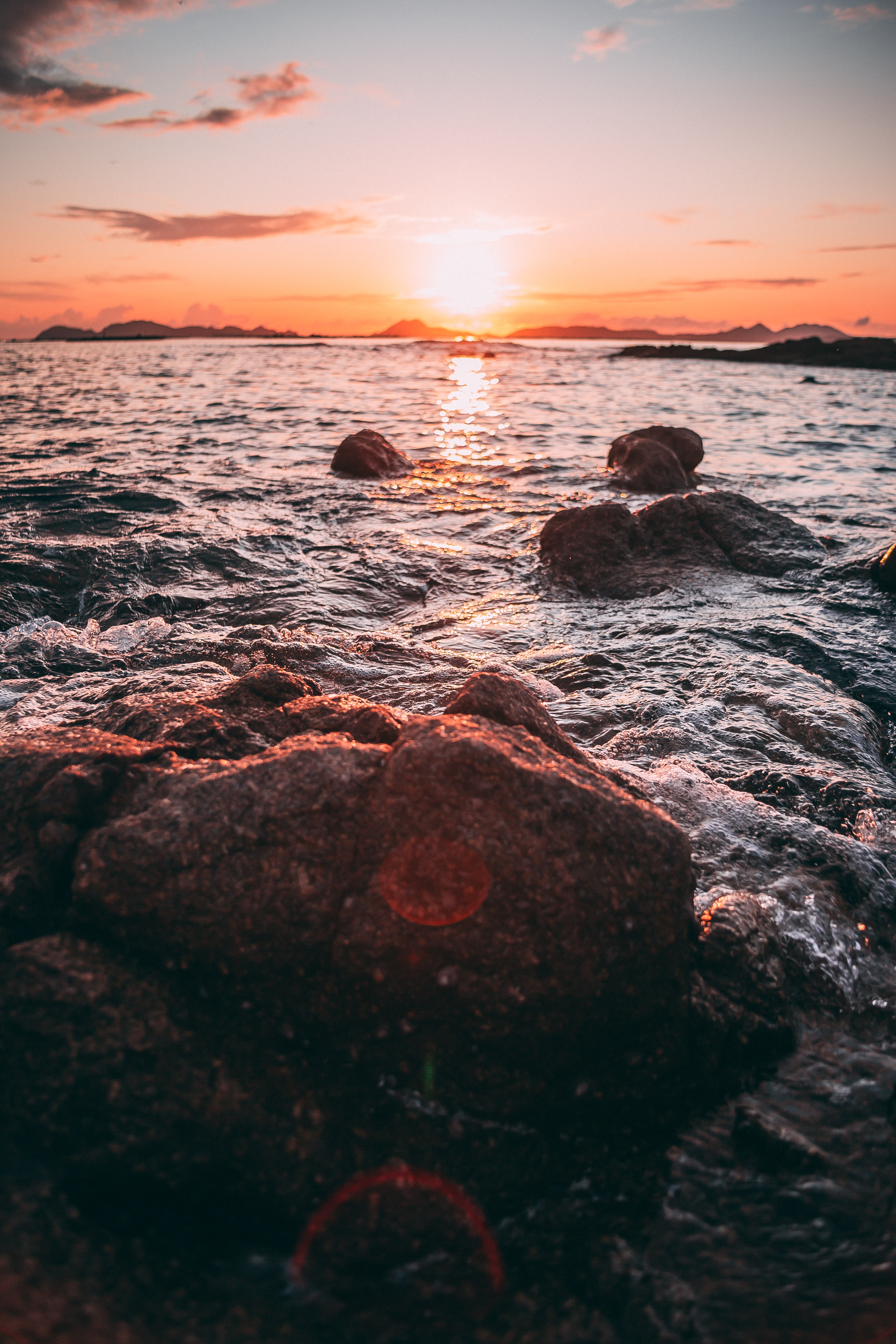 Free download wallpaper Water, Sunset, Stones, Coast, Nature, Waves on your PC desktop