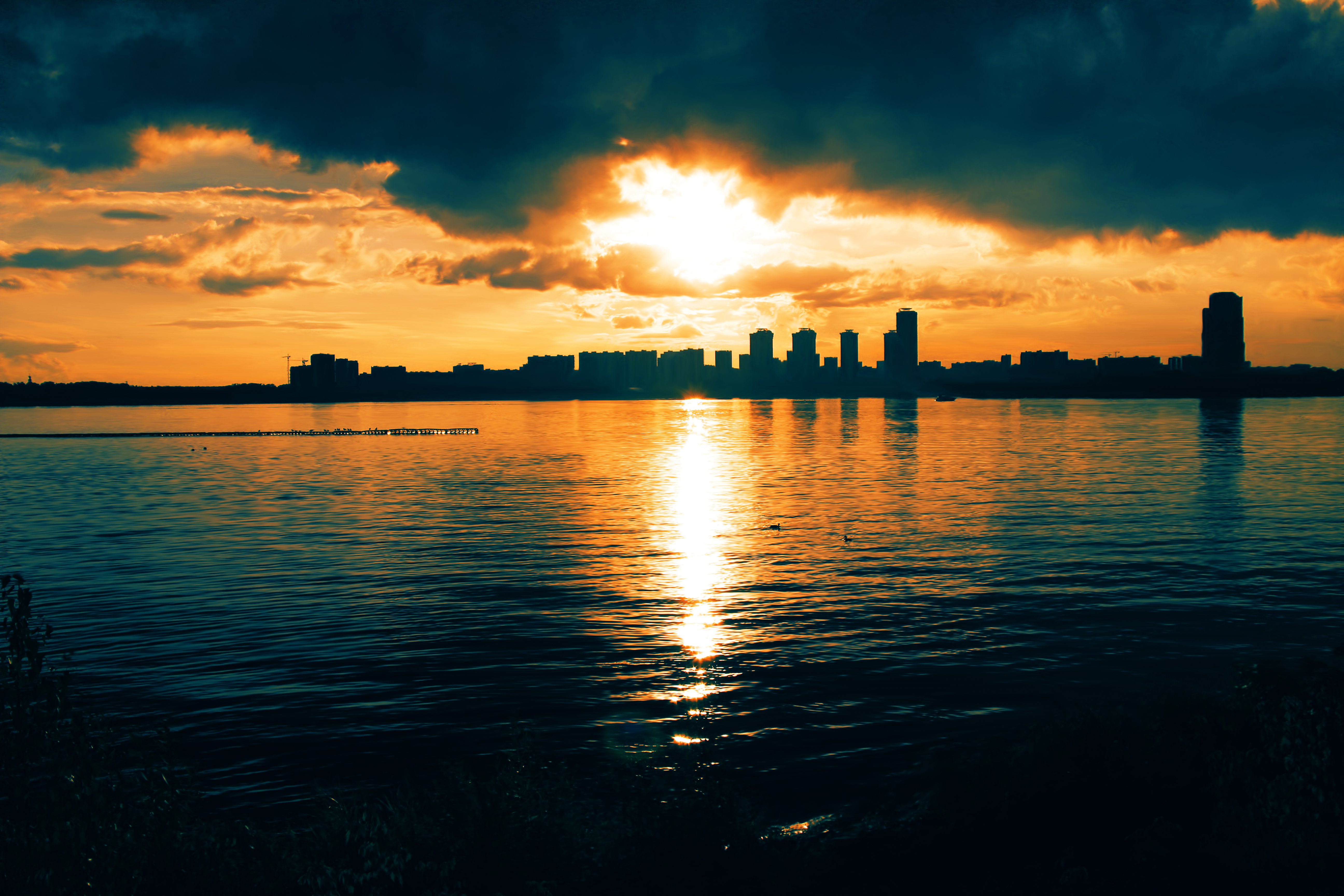 Download mobile wallpaper Sunset, Sea, City, Earth for free.