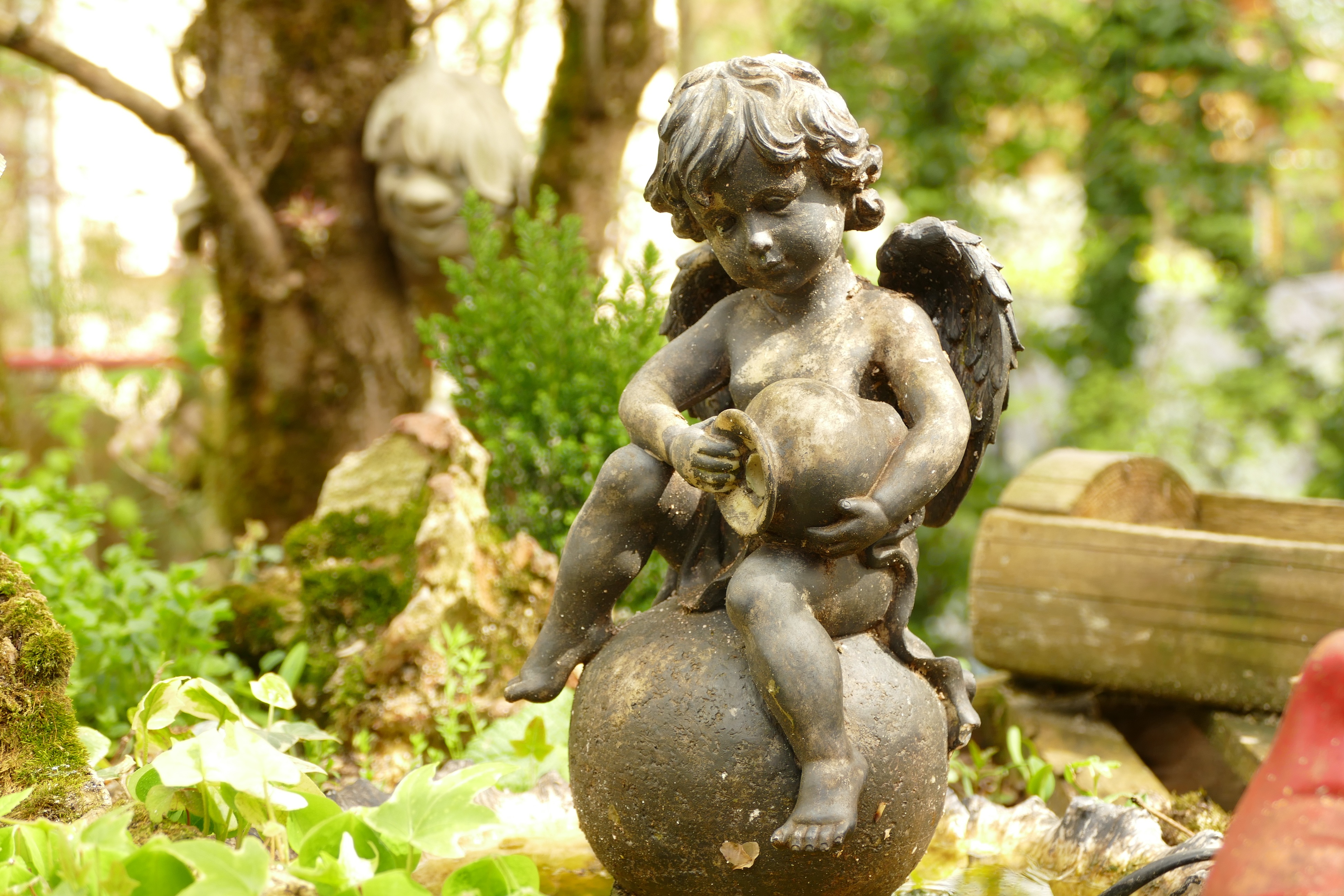 man made, cherub statue, angel statue, blur, bokeh, cherub, garden, old, statue