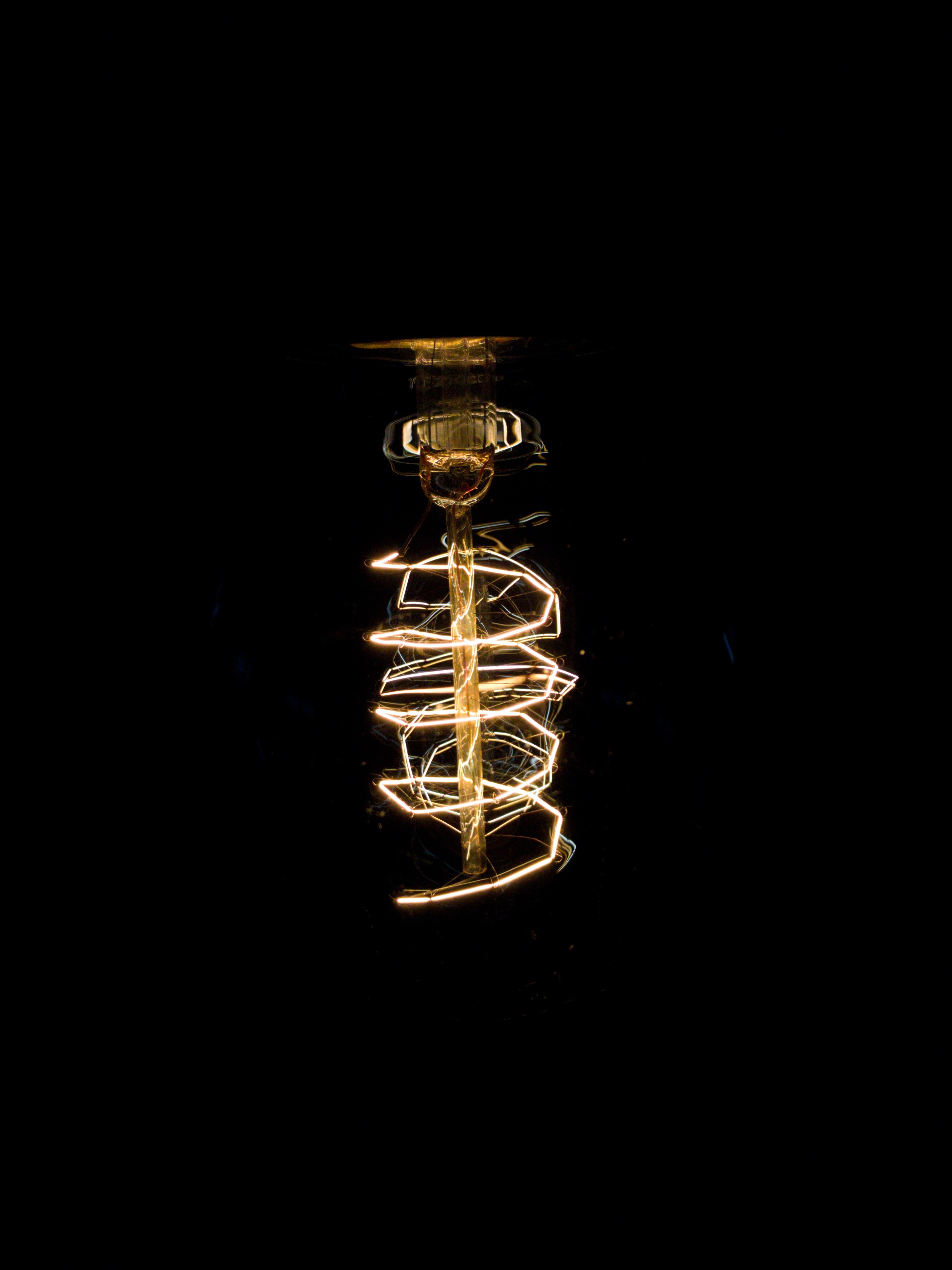 Download mobile wallpaper Lamp, Spiral, Shine, Light, Electricity, Dark for free.