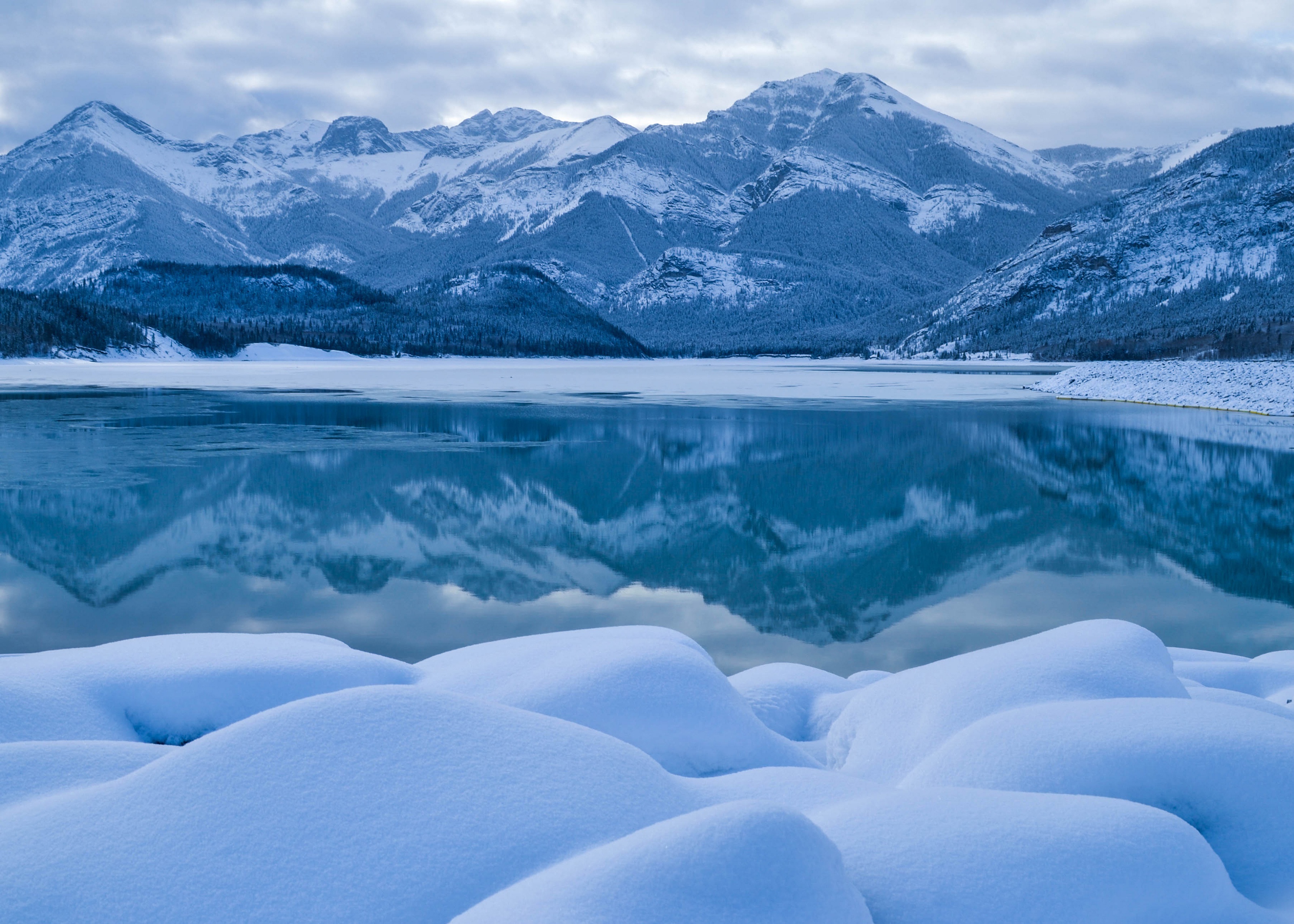 Download mobile wallpaper Winter, Nature, Snow, Mountain, Lake, Reflection, Earth for free.