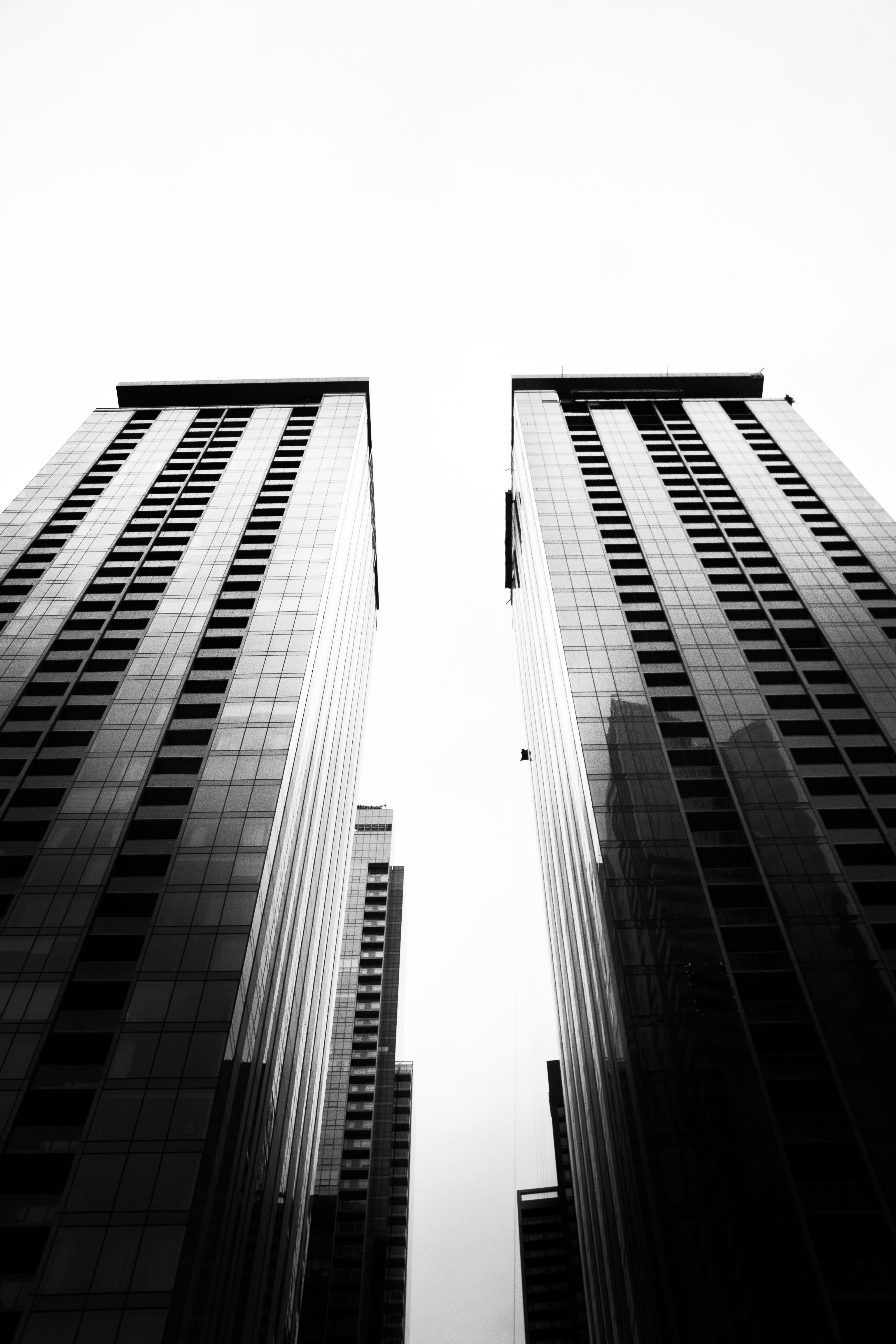 Download mobile wallpaper Building, Chb, Bottom View, Sky, Bw, Architecture, Minimalism for free.
