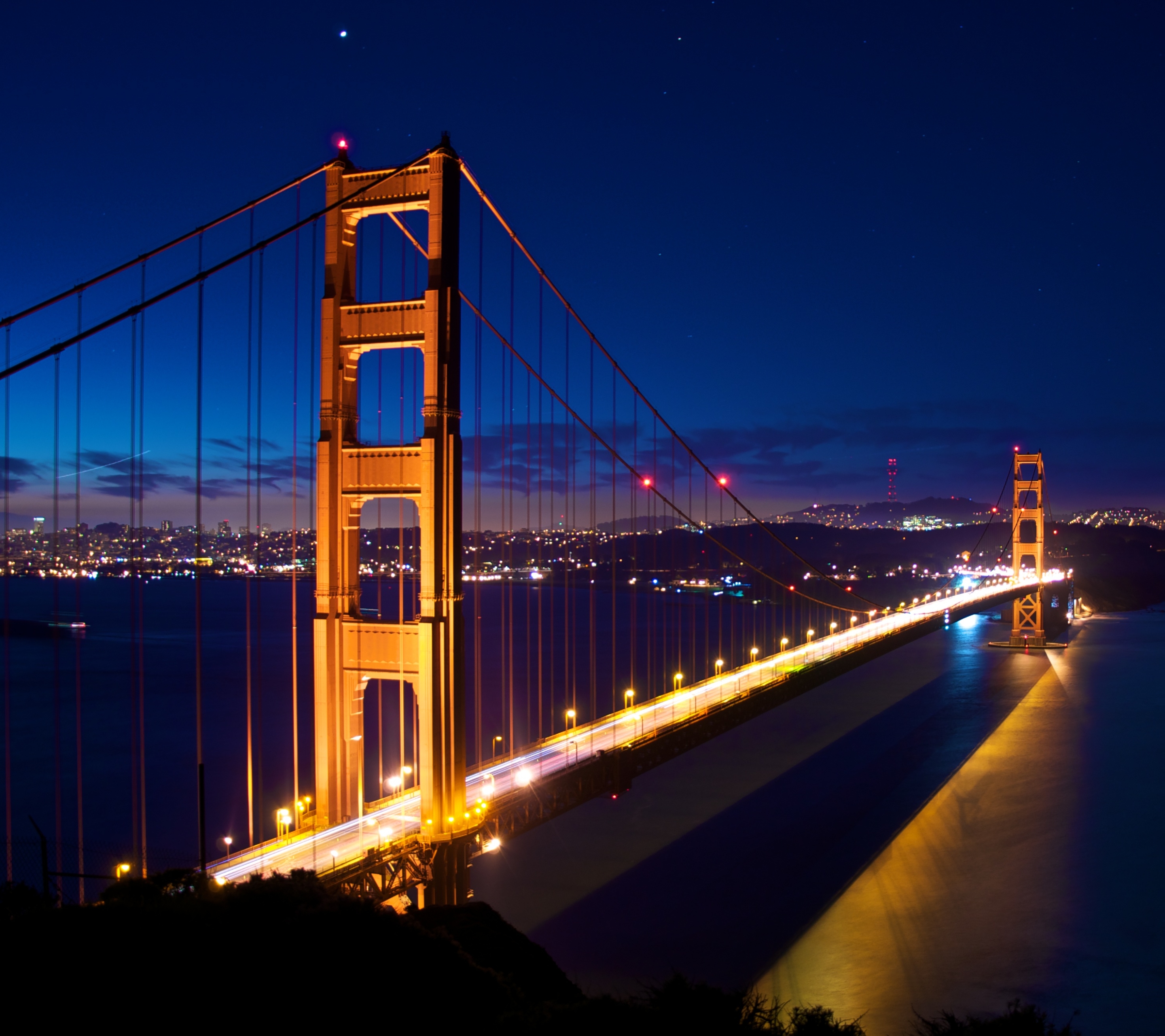 Download mobile wallpaper Bridges, City, Reflection, Light, Bridge, Bay, San Francisco, Golden Gate, Man Made for free.