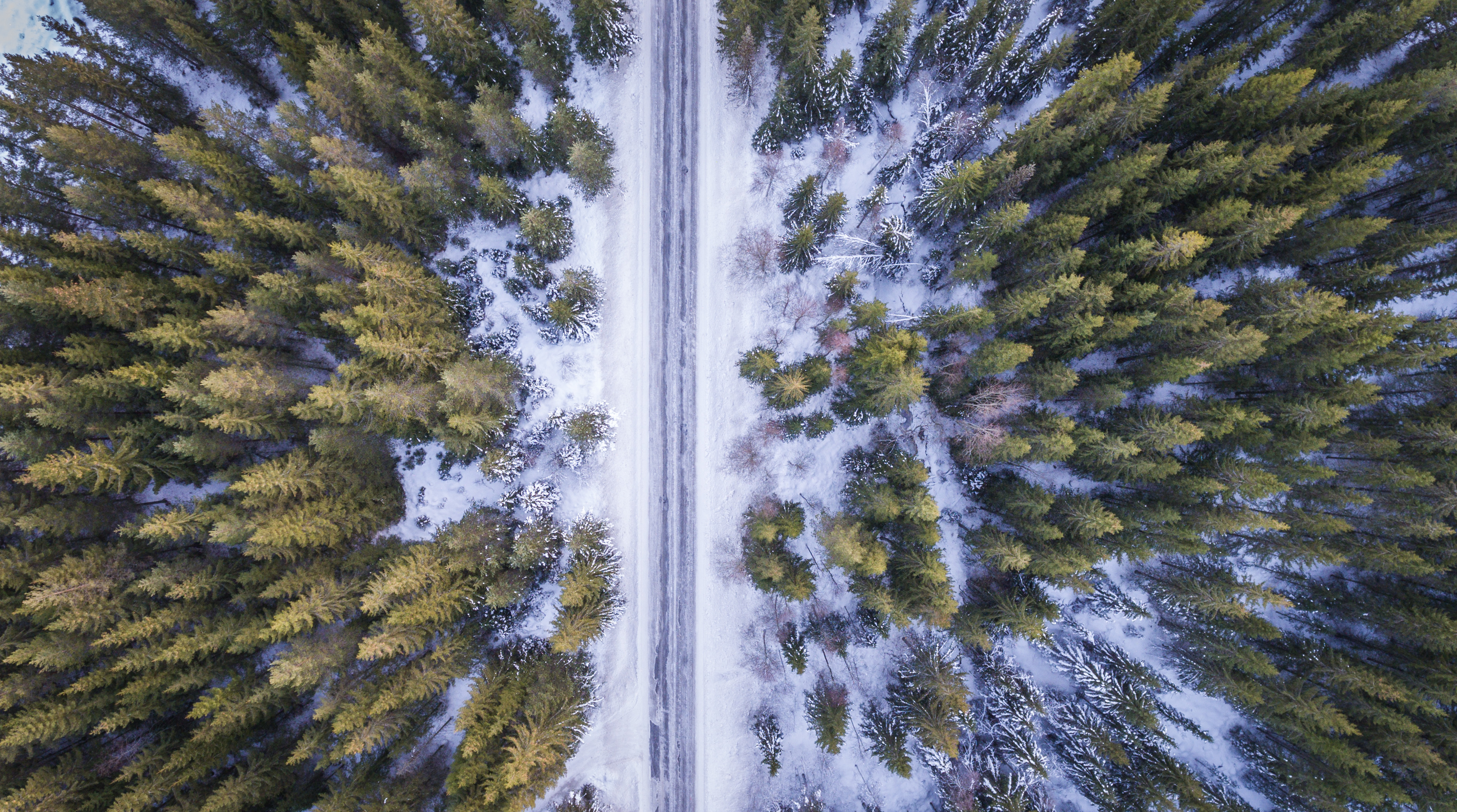 Download mobile wallpaper Winter, Nature, Road, Forest, Aerial, Man Made for free.