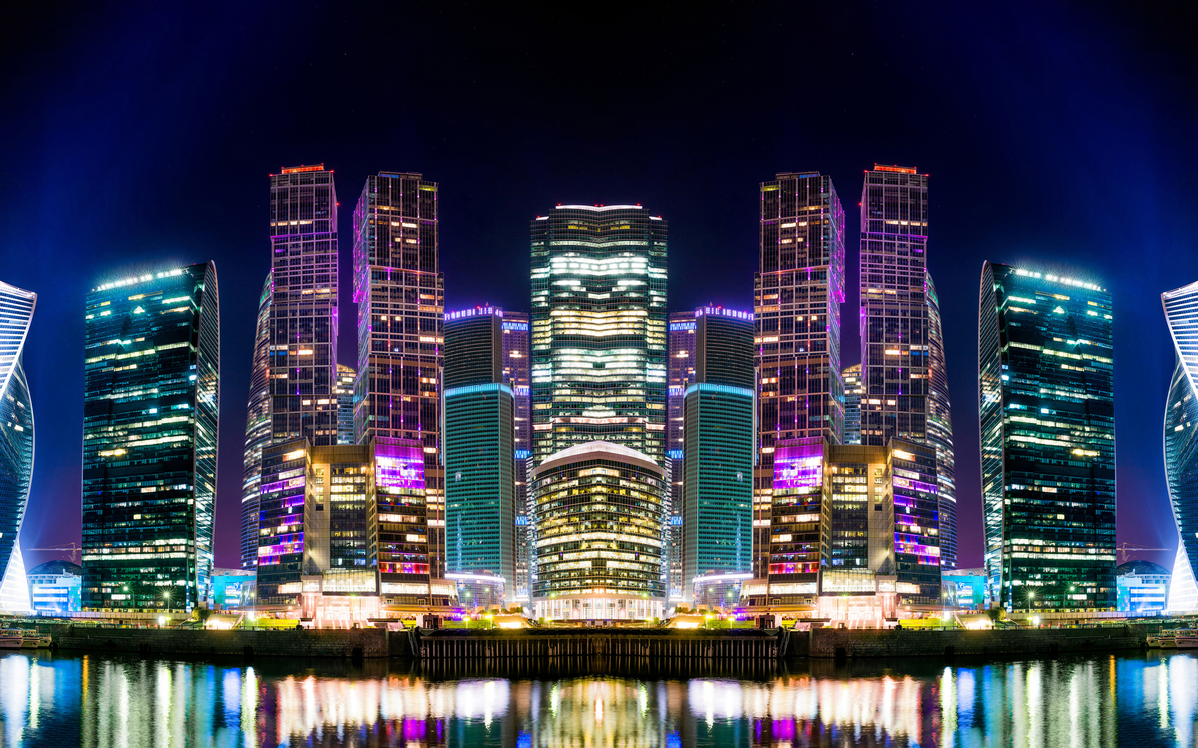 Download mobile wallpaper Cities, Night, Skyscraper, Building, Reflection, Light, Russia, River, Moscow, Man Made for free.