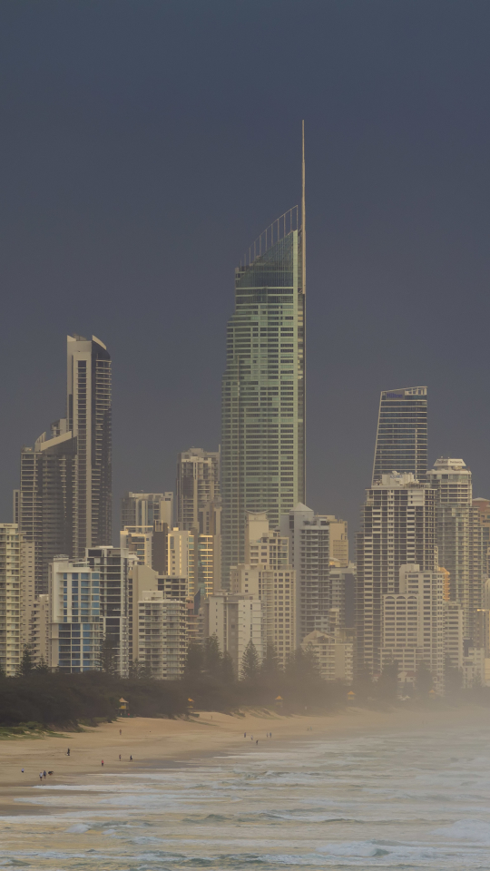 Download mobile wallpaper Cities, Sea, Beach, Fog, Morning, Wave, Australia, Man Made, Gold Coast, Queensland for free.