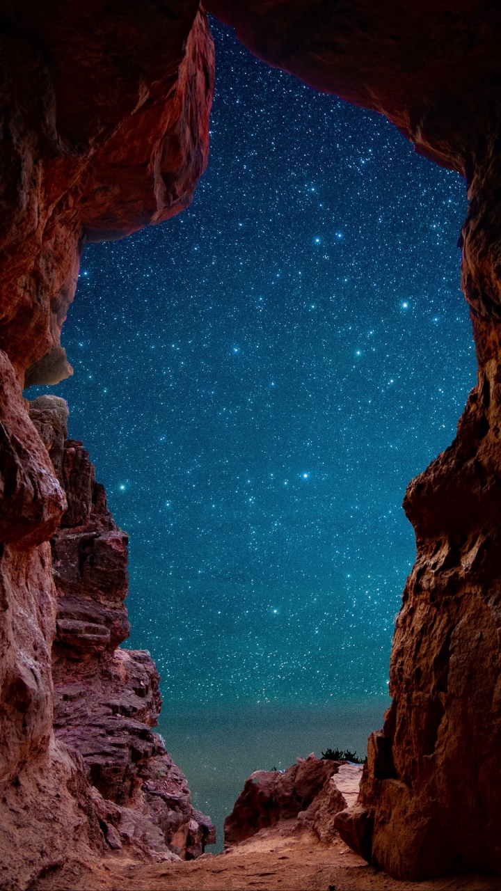 Download mobile wallpaper Sky, Stars, Night, Caves, Starry Sky, Earth, Cave for free.