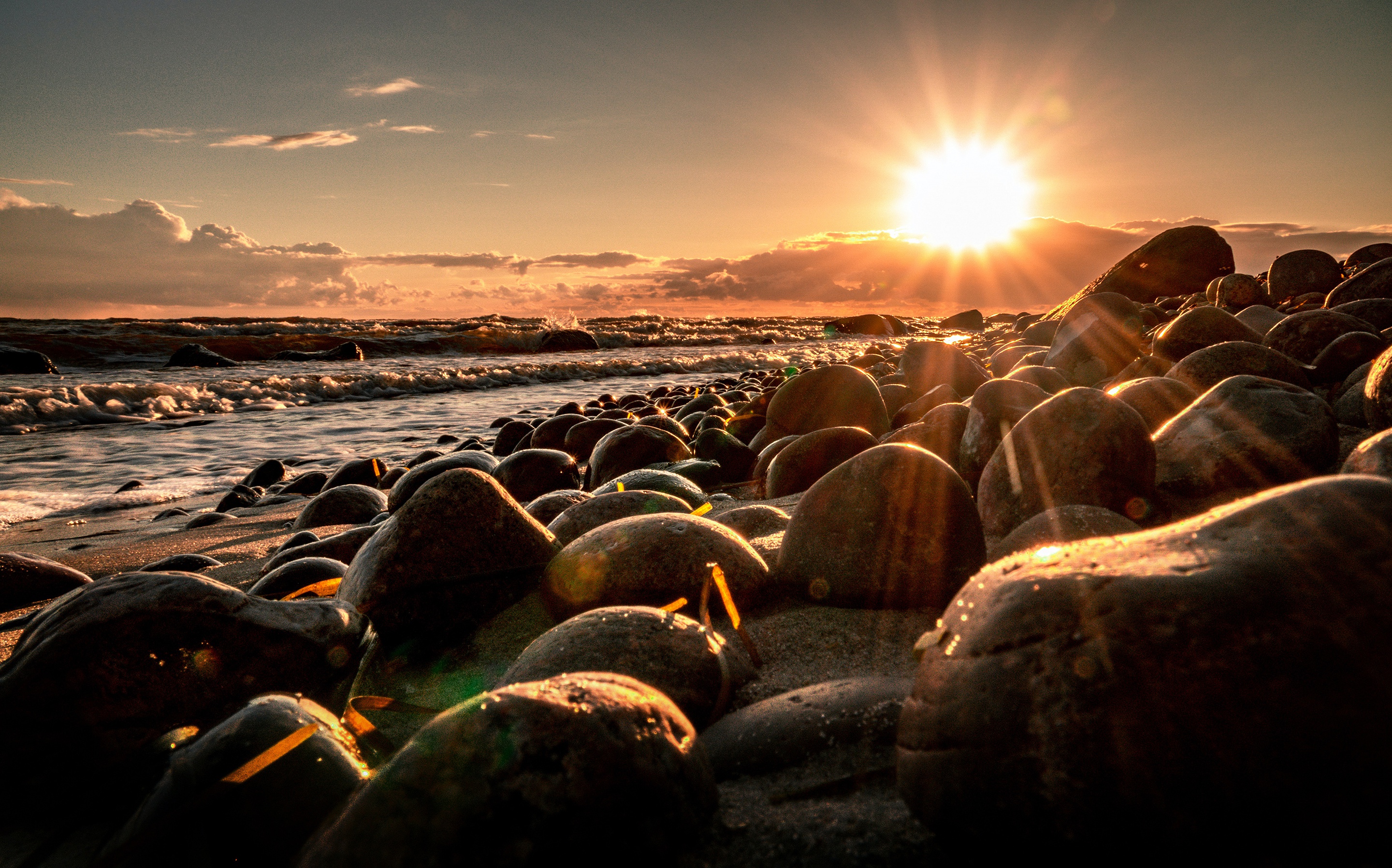 Download mobile wallpaper Sunset, Sea, Sun, Coast, Earth, Stone, Coastline for free.