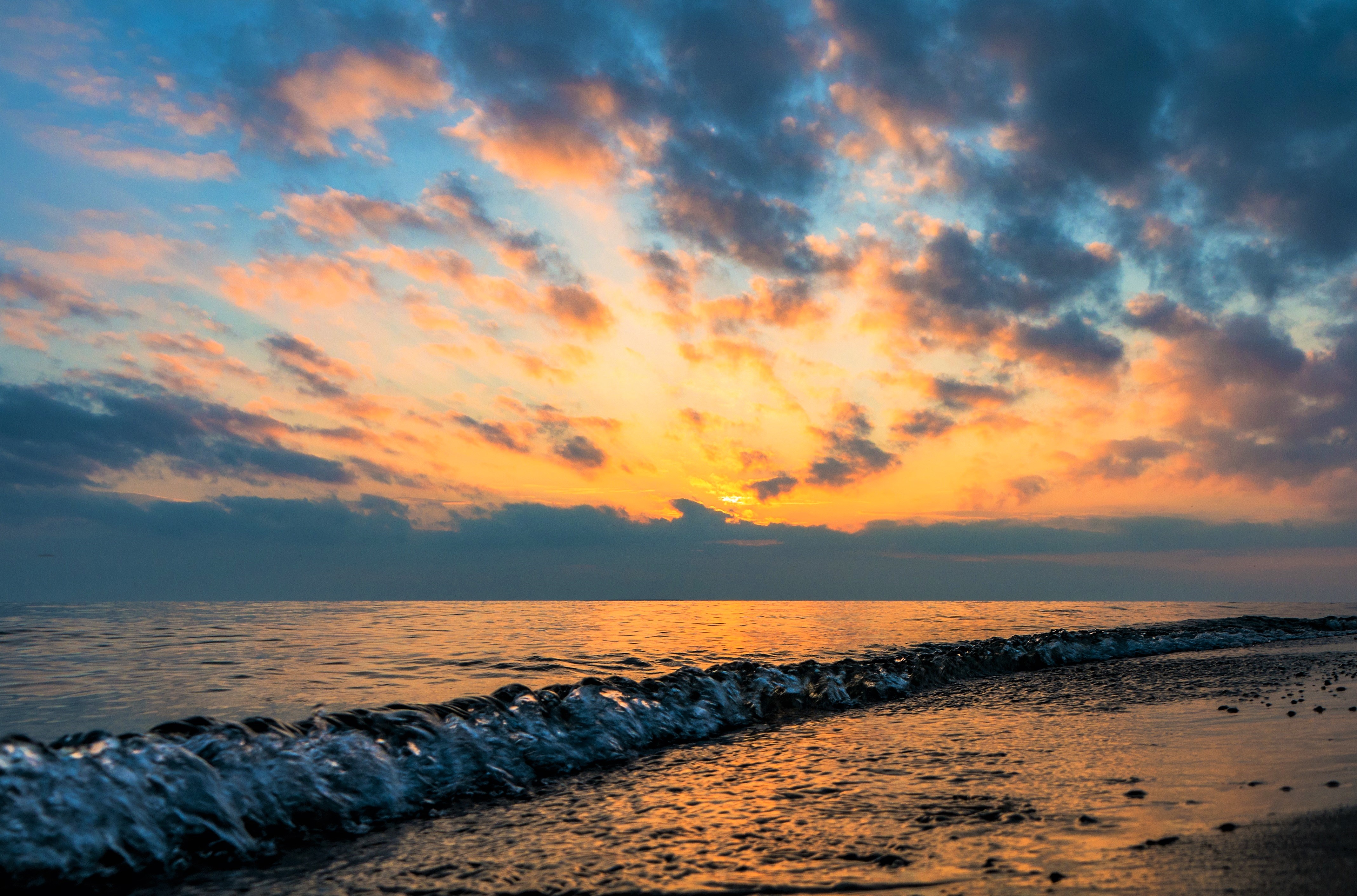 Download mobile wallpaper Sunset, Sea, Horizon, Ocean, Earth, Wave for free.