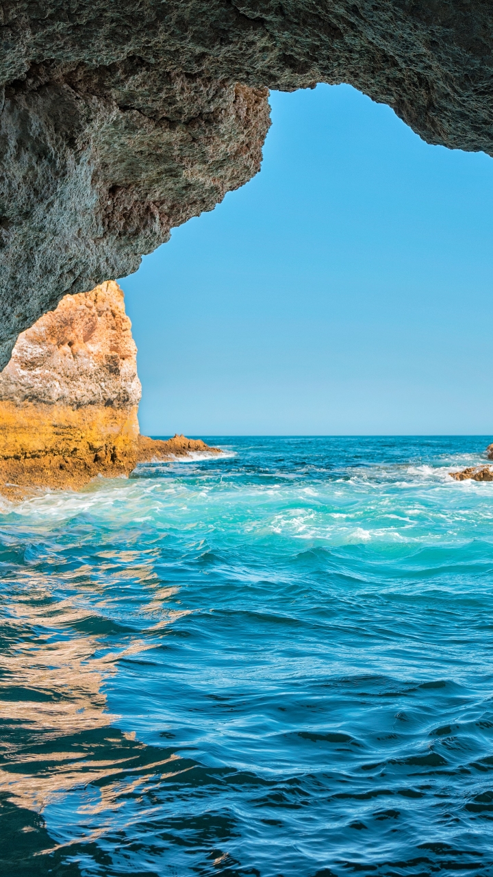 Скачати мобільні шпалери Море, Печери, Горизонт, Океан, Земля, Печера, Португалія безкоштовно.