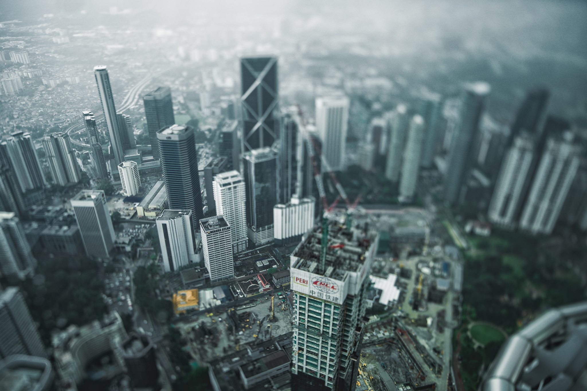 Download mobile wallpaper Cities, City, Skyscraper, Building, Kuala Lumpur, Malaysia, Aerial, Tilt Shift, Man Made, Depth Of Field for free.