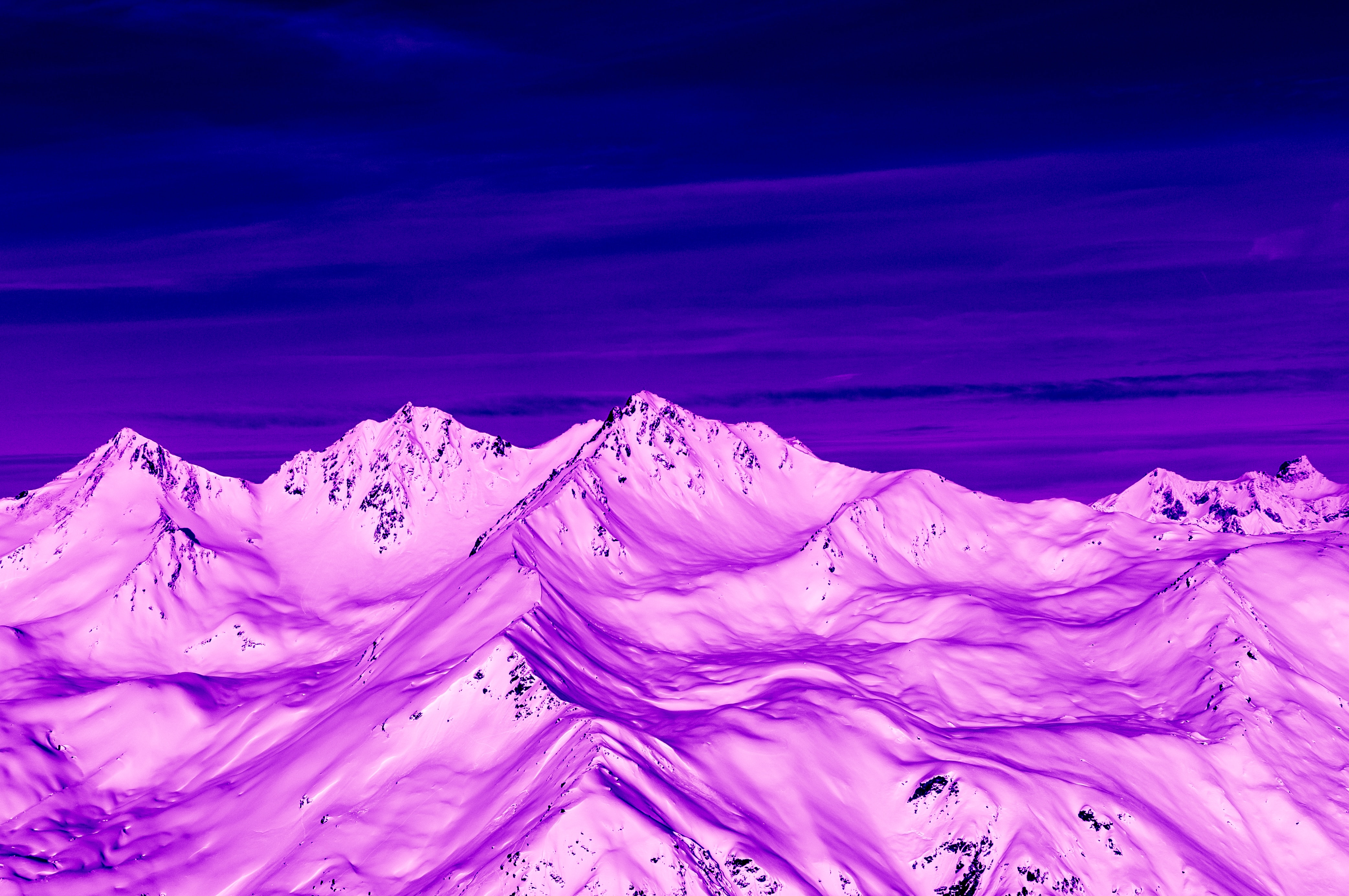 Download mobile wallpaper Vertex, View From Above, Tops, Dusk, Snow, Twilight, Nature, Violet, Mountains, Purple for free.