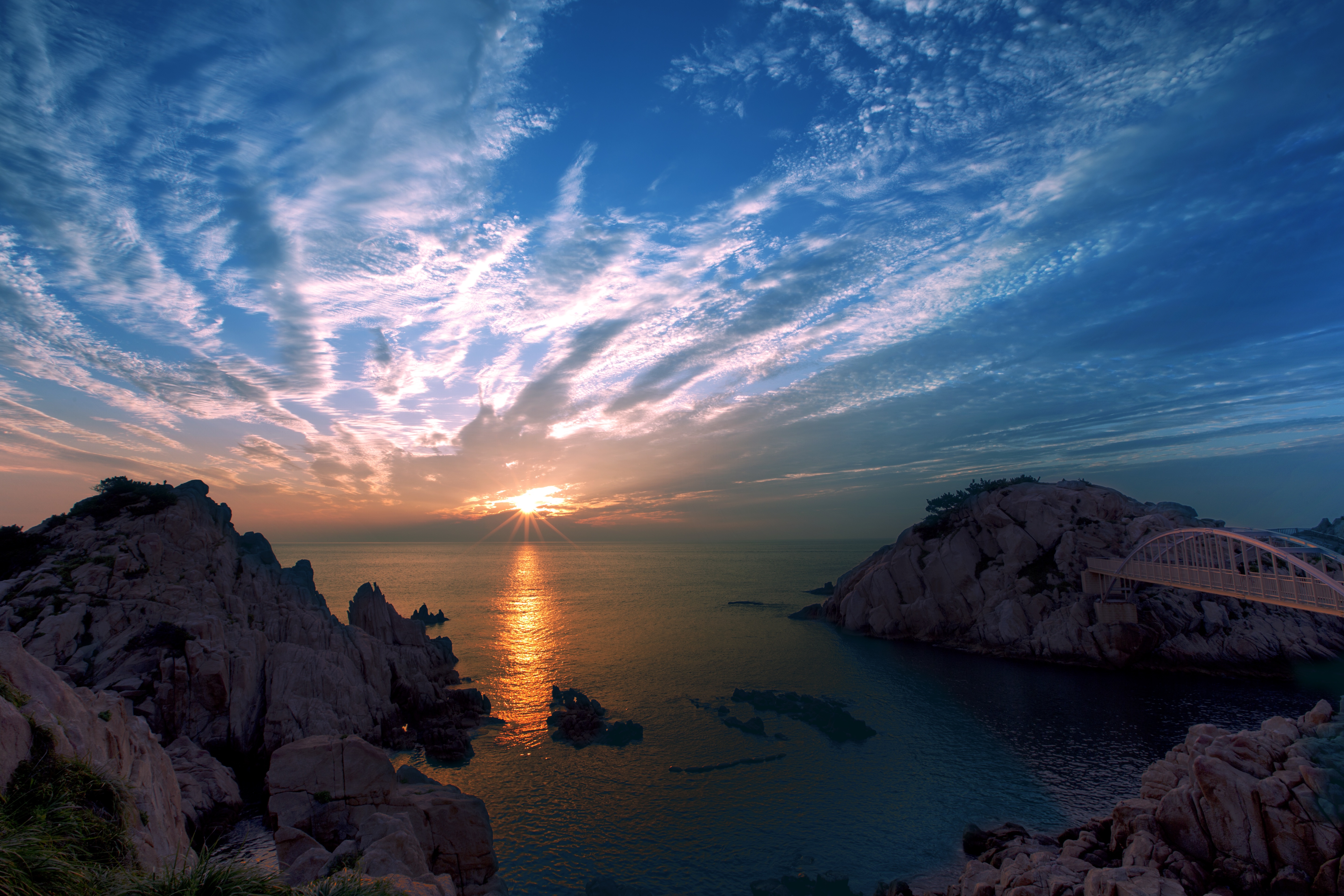 Download mobile wallpaper Sunset, Sky, Sea, Horizon, Coast, Ocean, Bridge, Cloud, Photography for free.