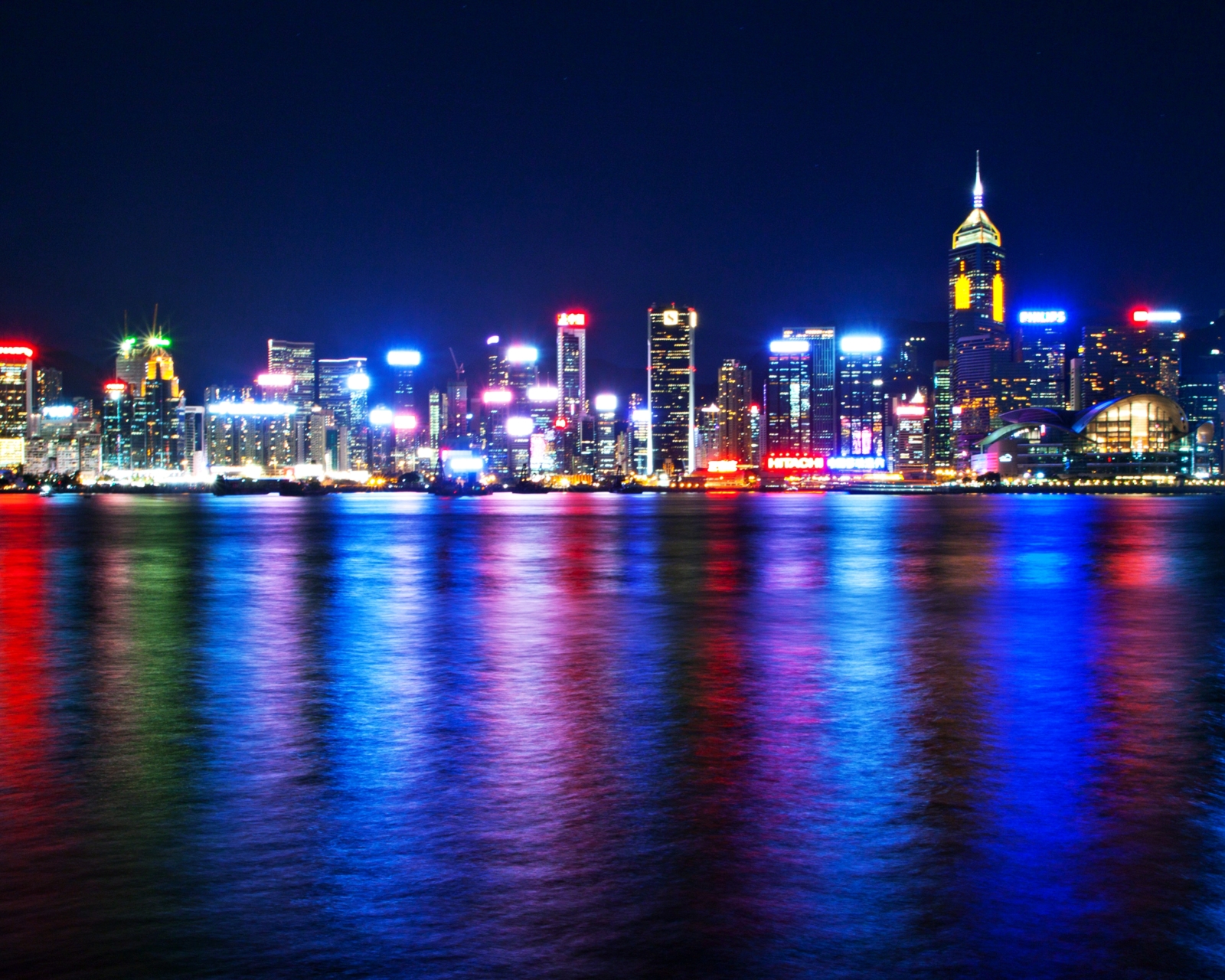 Download mobile wallpaper Cities, Night, City, Skyscraper, Building, Reflection, Light, Hong Kong, Man Made for free.