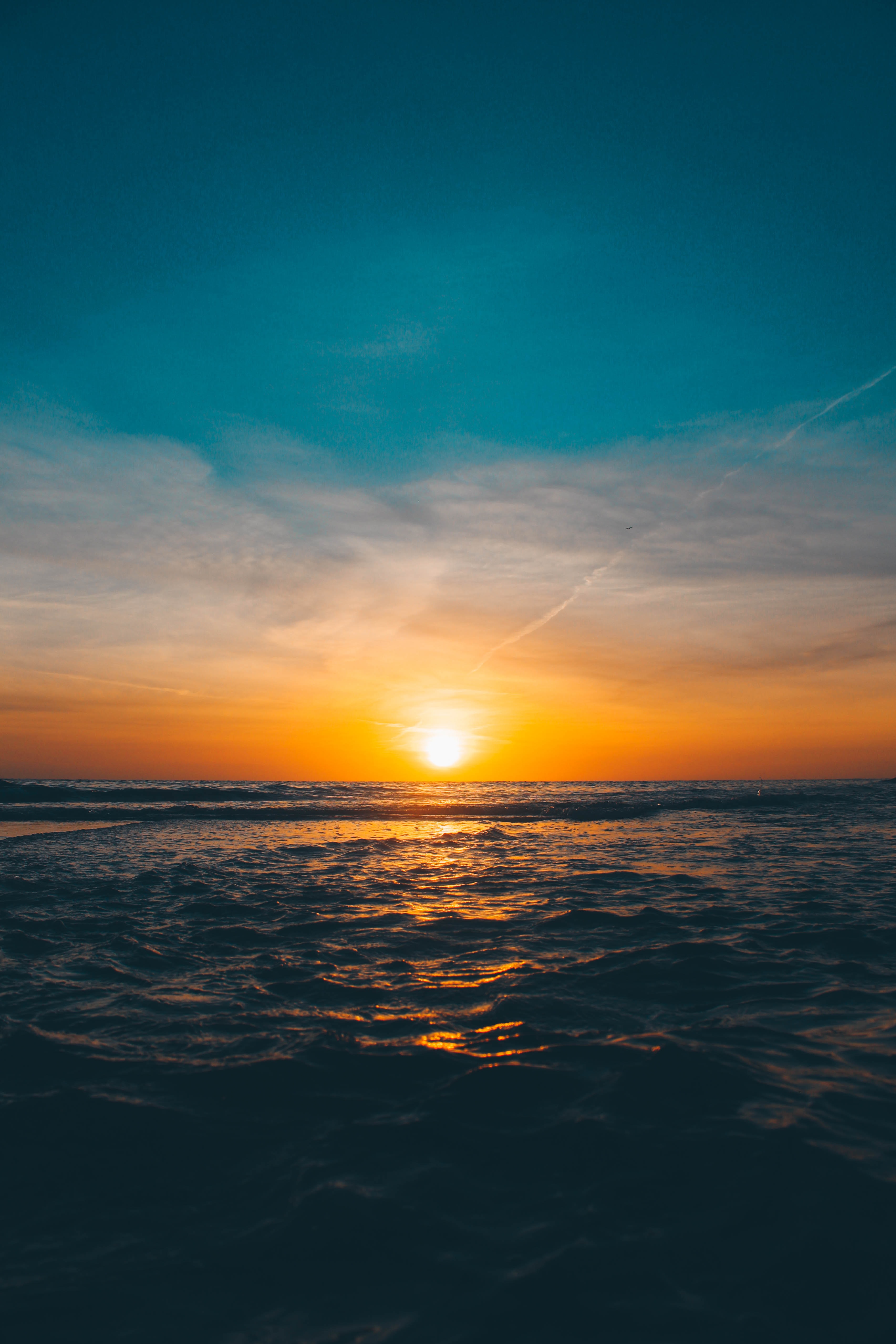 Download mobile wallpaper Sunset, Waves, Horizon, Nature, Sun, Sea for free.