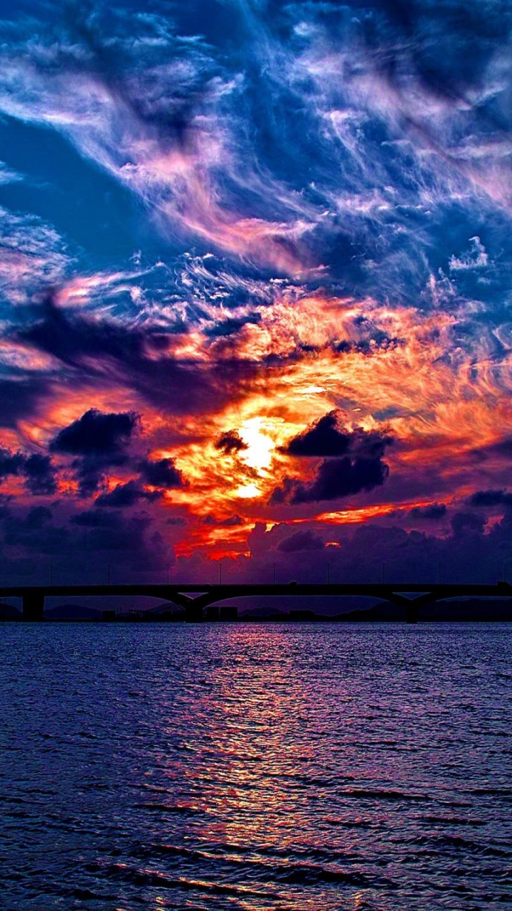 Download mobile wallpaper Sunset, Sky, Sea, Ocean, Earth, Bridge, Photography for free.