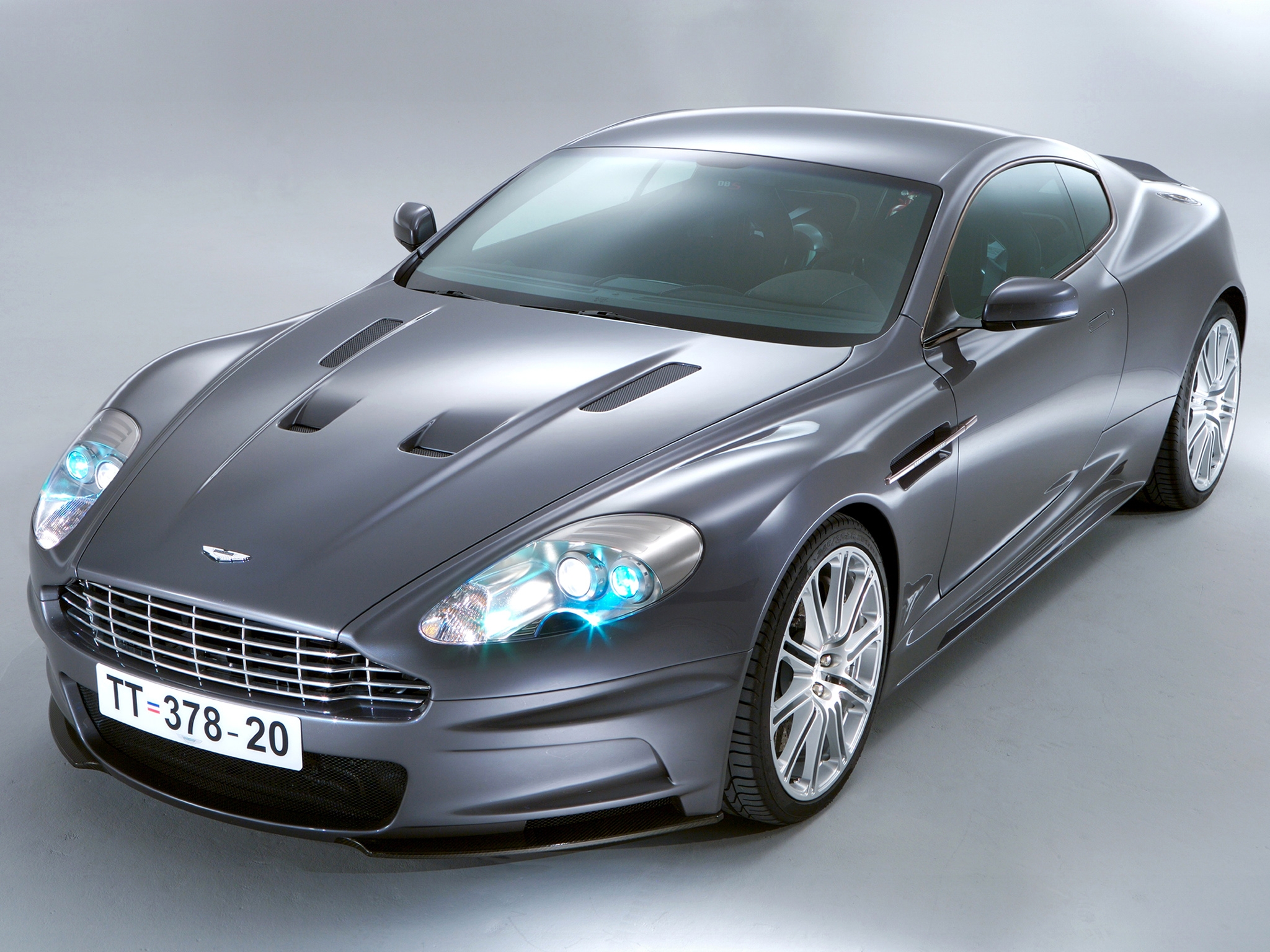 Download mobile wallpaper Dbs, 2006, Aston Martin, Grey, Auto, Cars, Front View for free.
