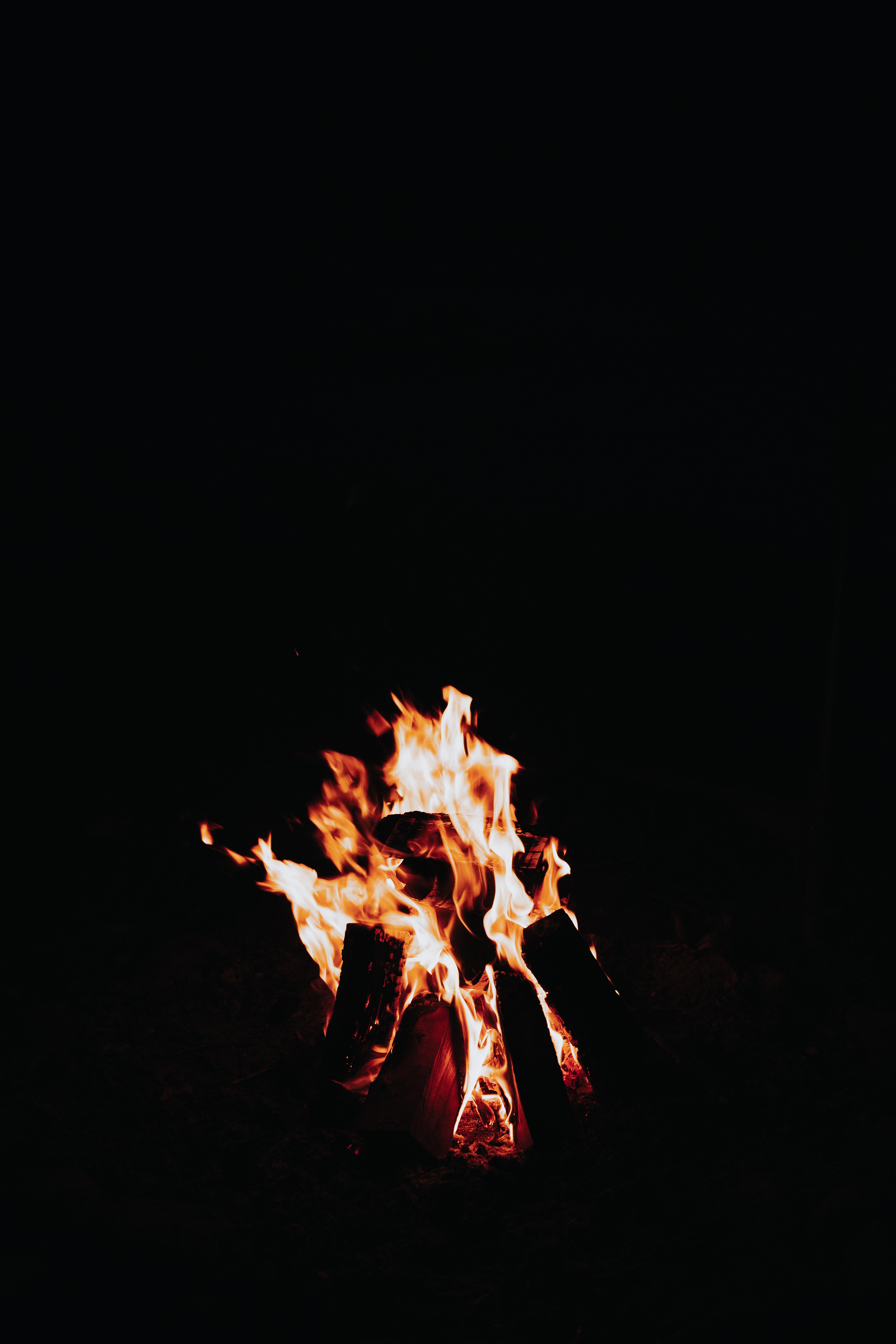 Download mobile wallpaper Flame, Sparks, Fire, Bonfire, Dark for free.