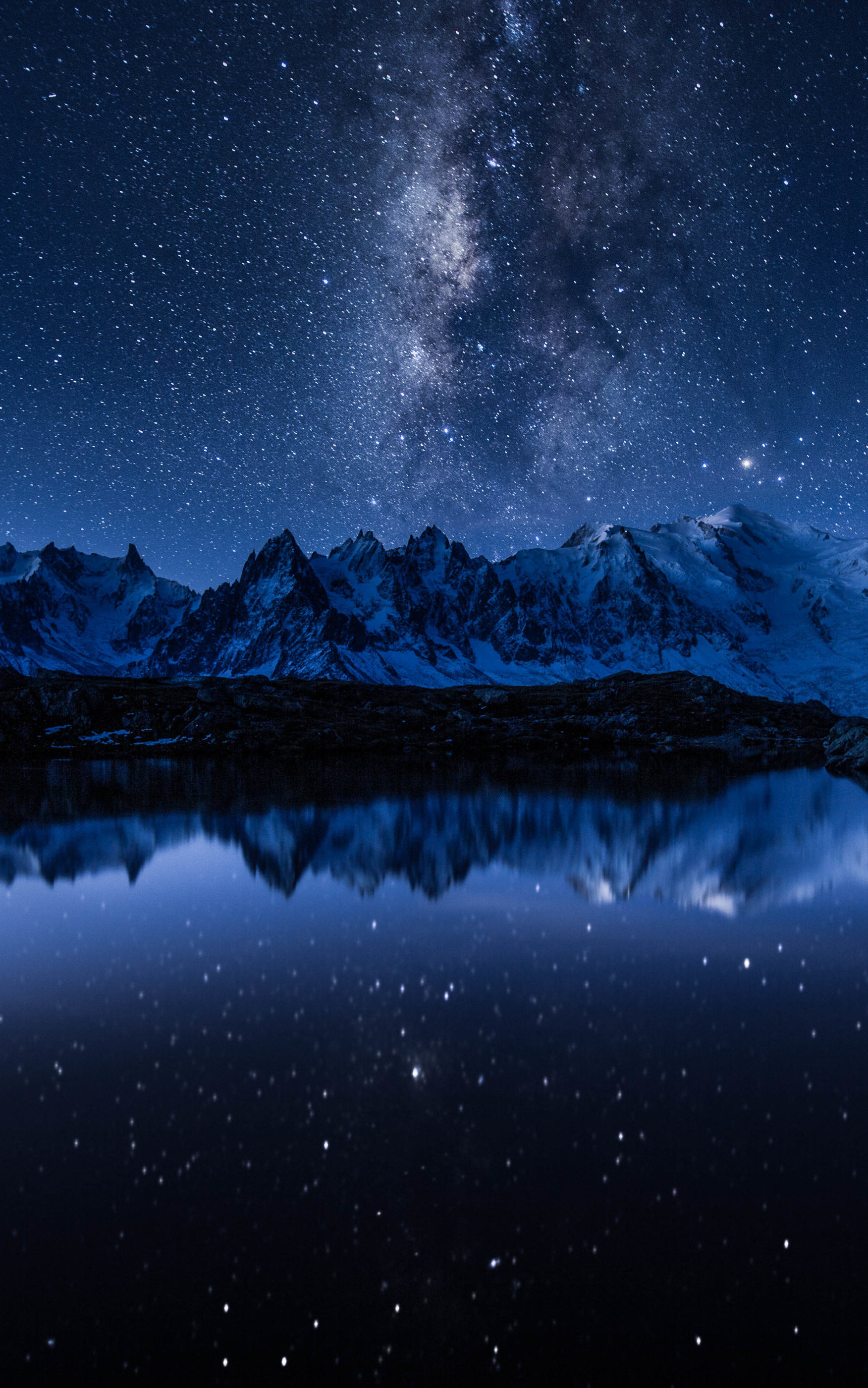Download mobile wallpaper Landscape, Nature, Water, Sky, Stars, Night, Mountain, Reflection, Earth, Milky Way for free.