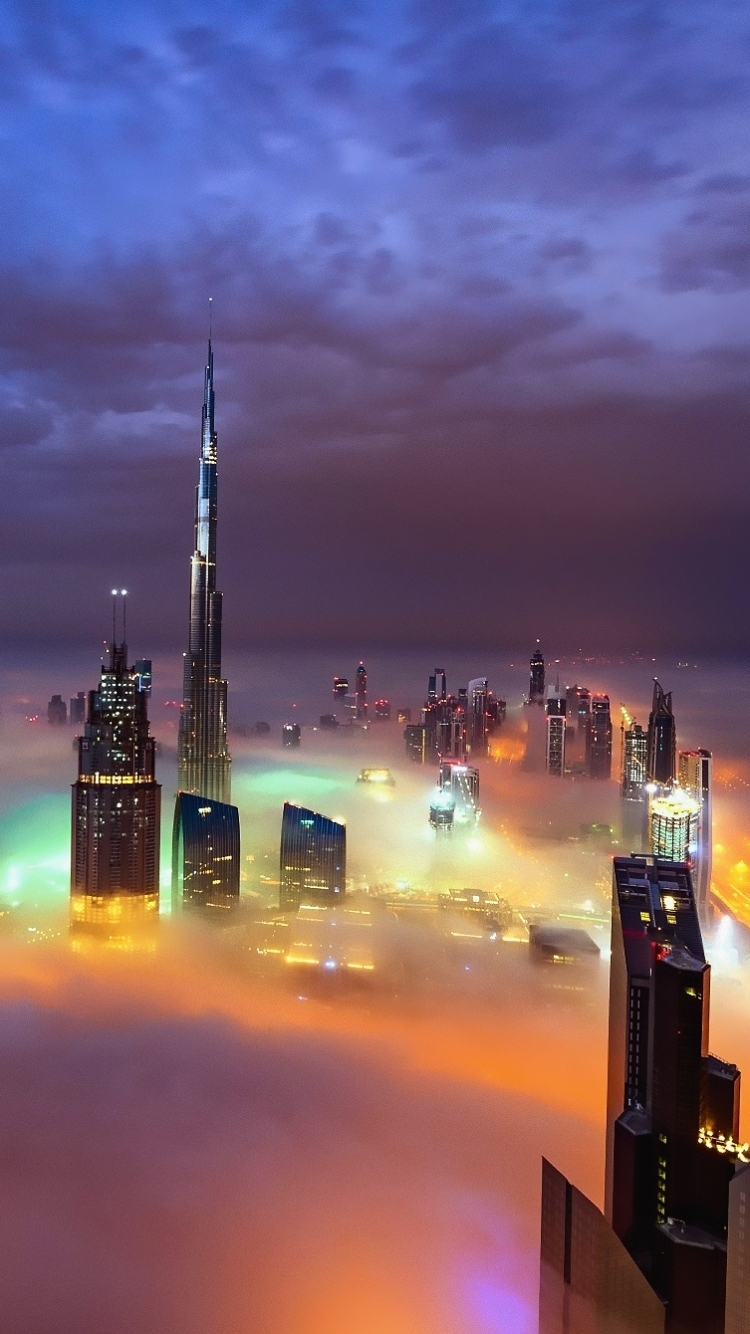Handy-Wallpaper Städte, Stadt, Wolkenkratzer, Gebäude, Horizont, Licht, Dubai, Wolke, Vereinigte Arabische Emirate, Nacht, Menschengemacht, Großstadt kostenlos herunterladen.
