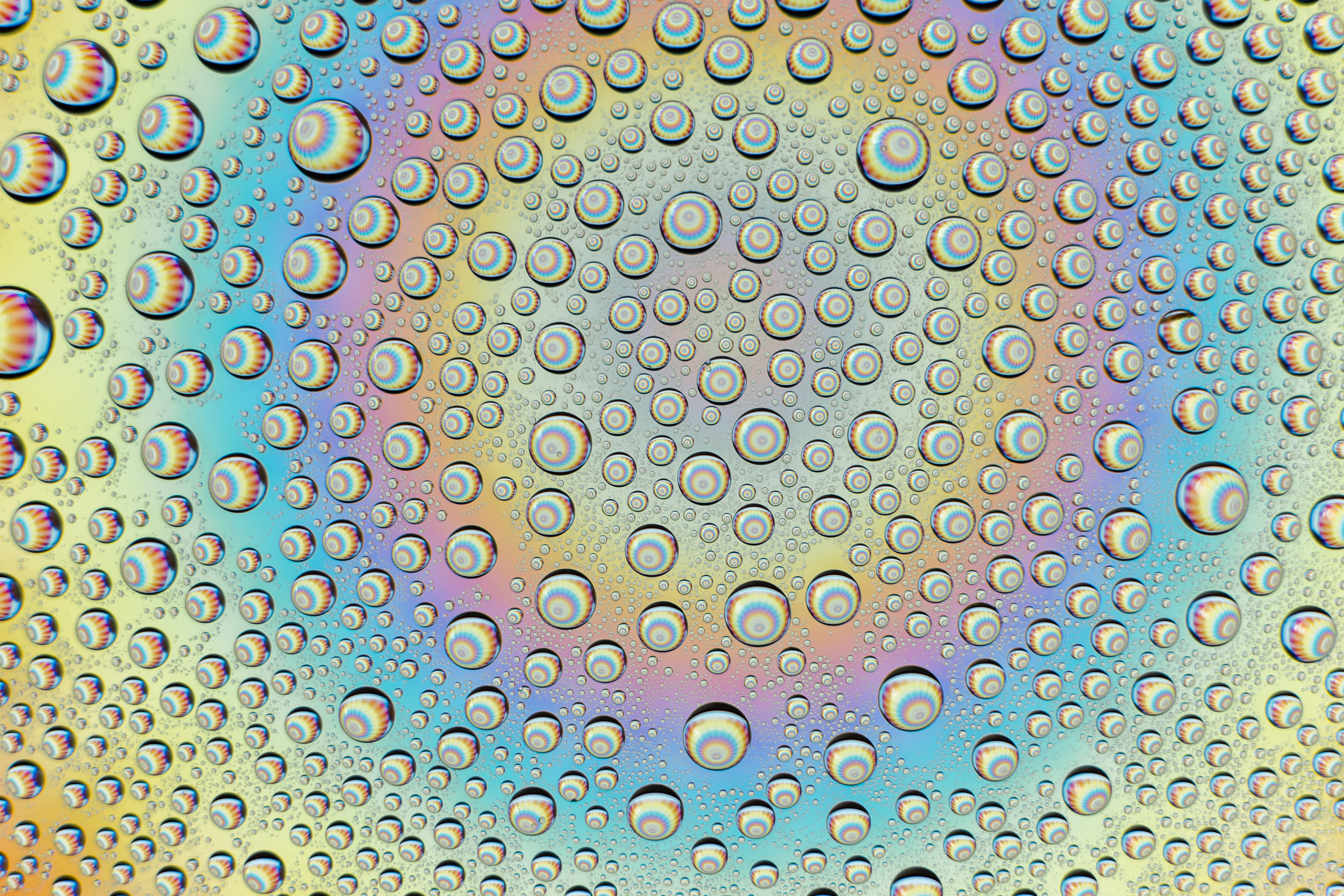 Download mobile wallpaper Motley, Water, Drops, Abstract, Multicolored, Rainbow for free.