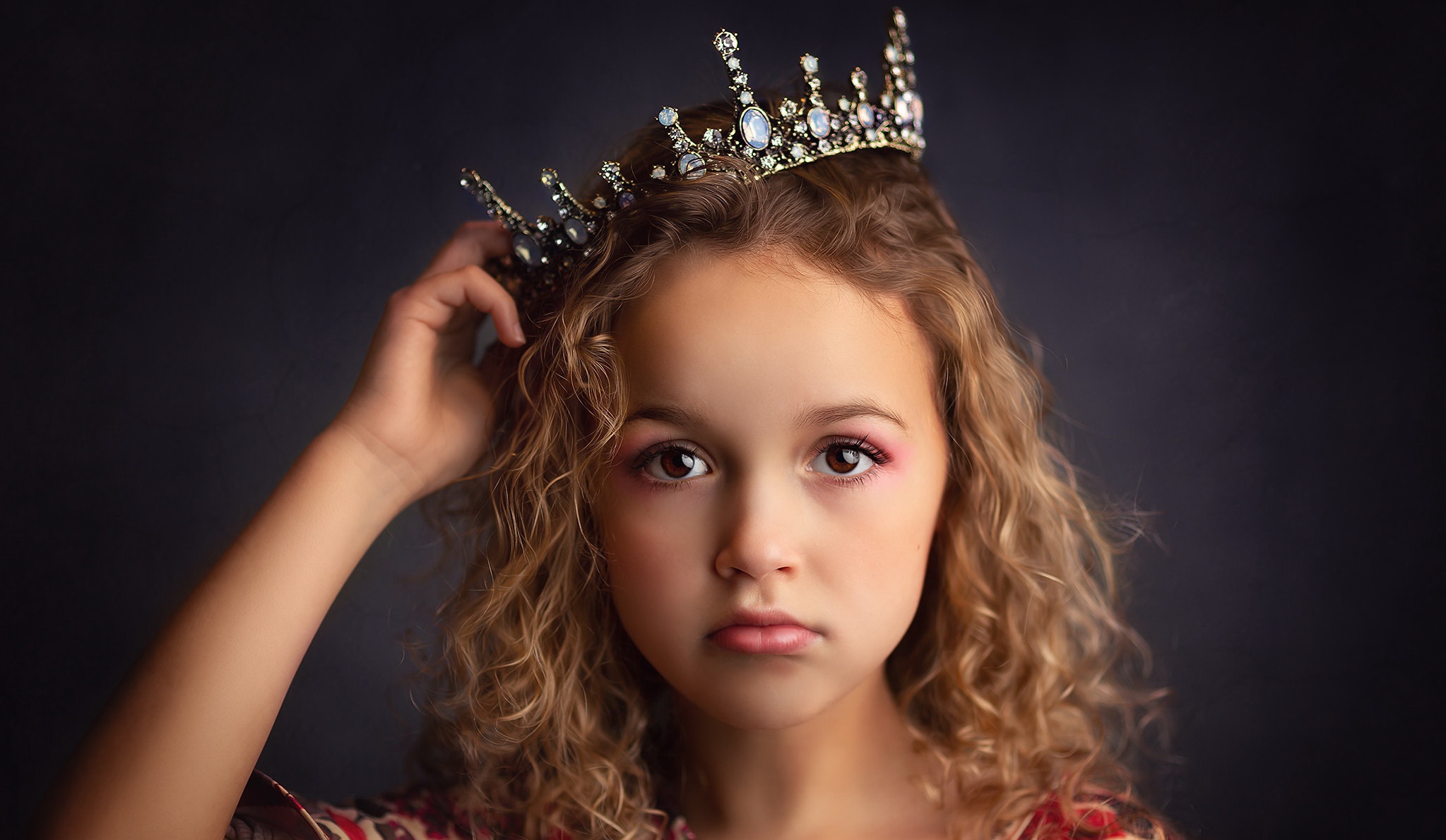 Download mobile wallpaper Crown, Child, Blonde, Face, Photography, Brown Eyes, Little Girl for free.