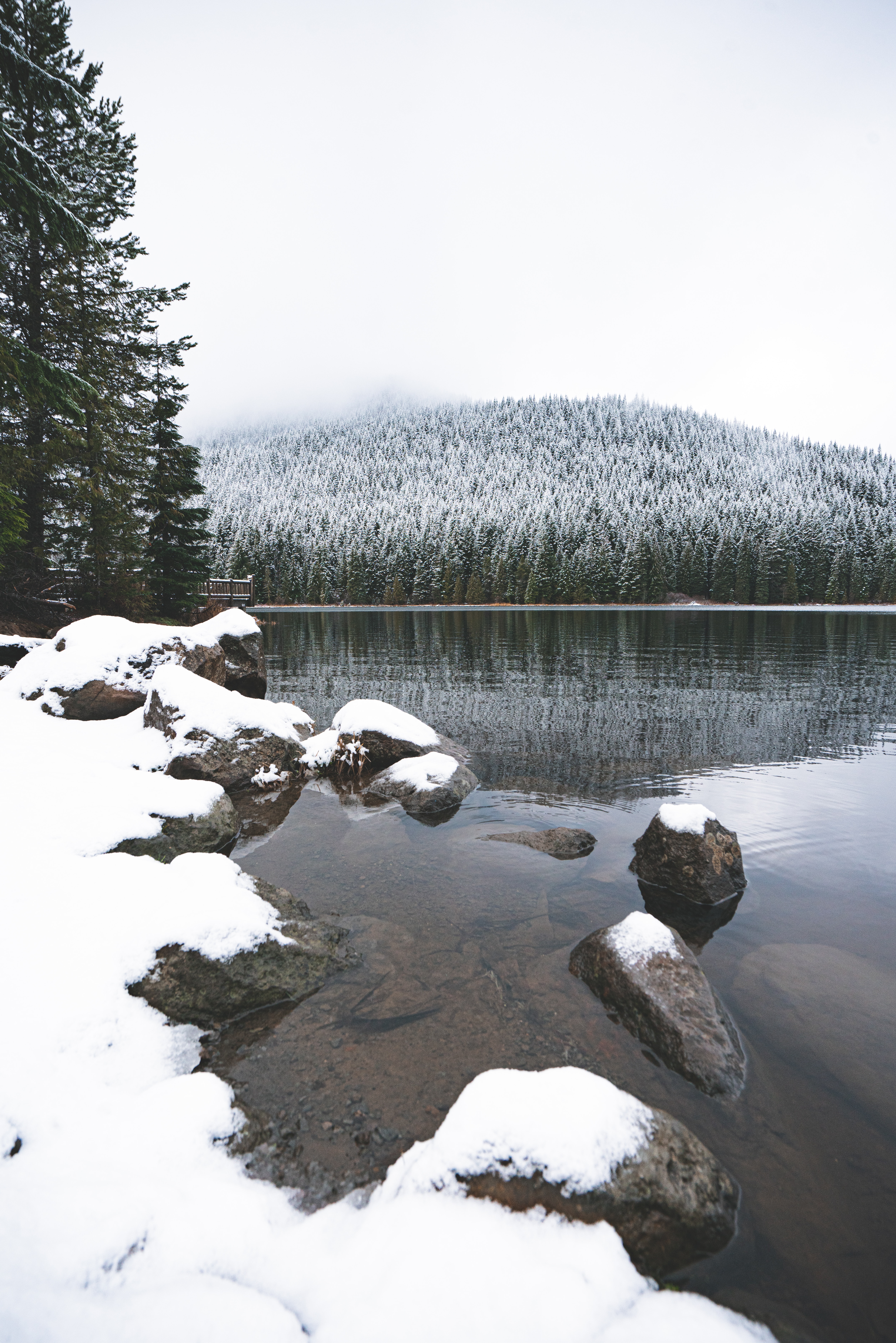 Free download wallpaper Stones, Lake, Winter, Forest, Nature, Snow, Landscape on your PC desktop