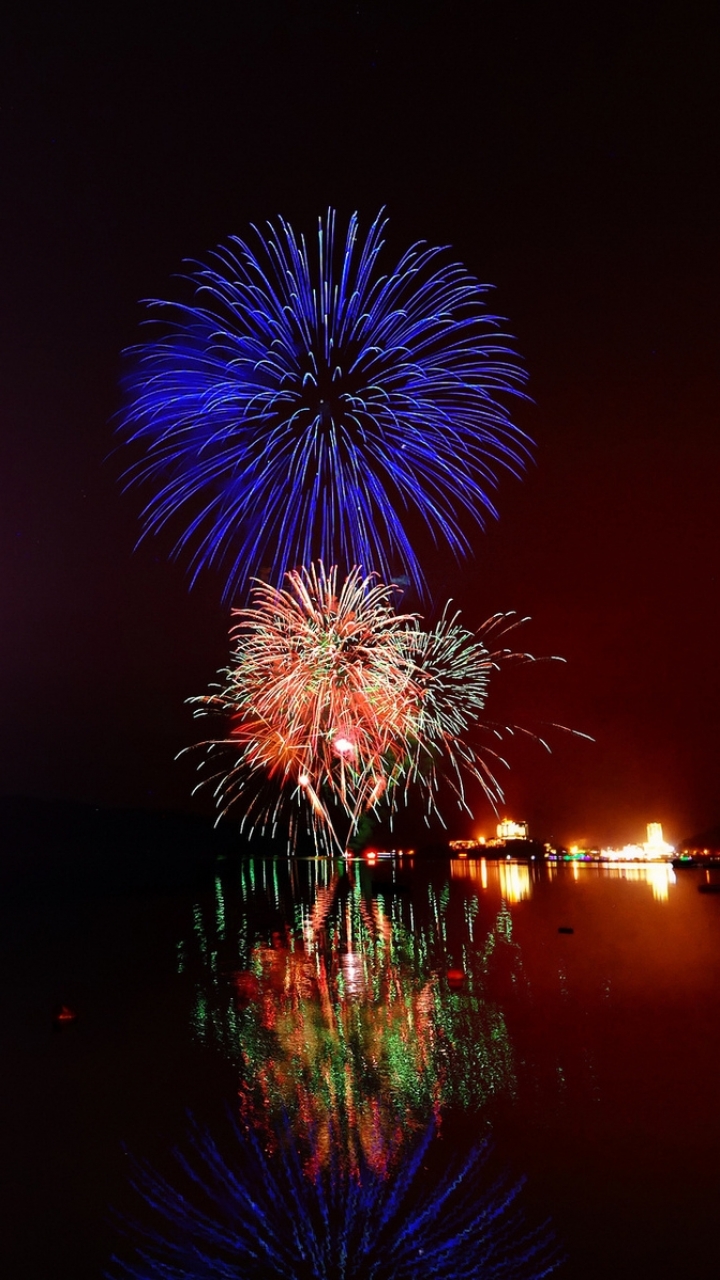 Download mobile wallpaper Water, Night, Reflection, Holiday, Fireworks, Photography for free.