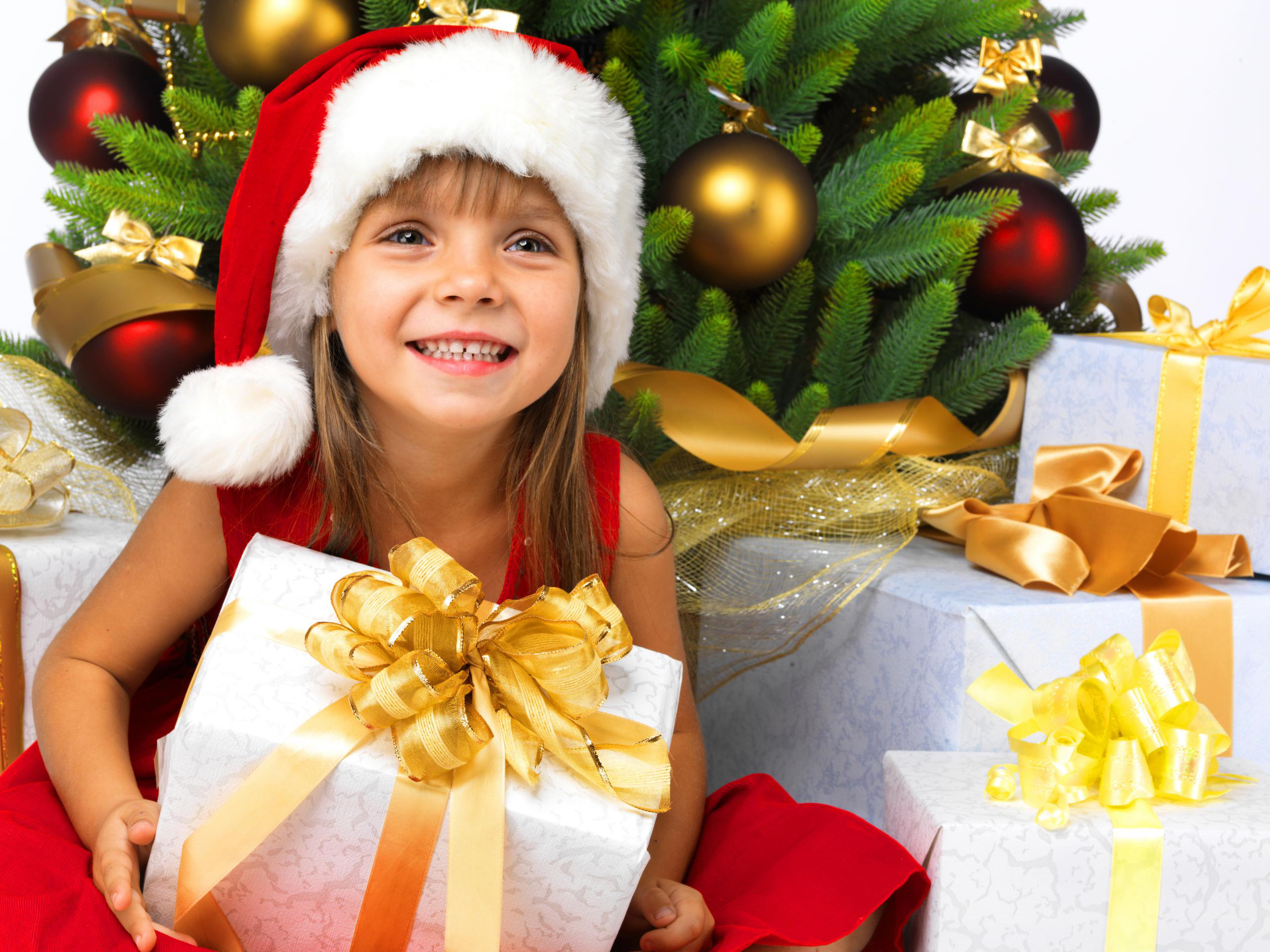 Скачать картинку Рождество, Ребёнок, Подарки, Рождественские Украшения, Праздничные, Шляпа Санты в телефон бесплатно.