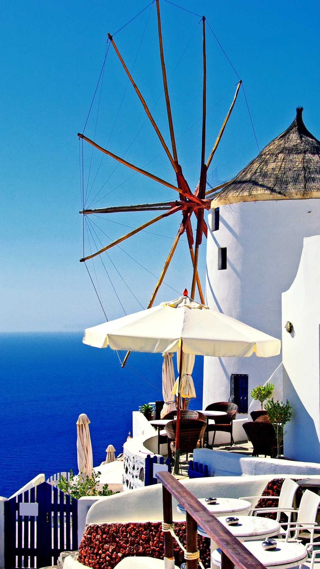 Download mobile wallpaper Greece, Windmill, Santorini, Man Made for free.
