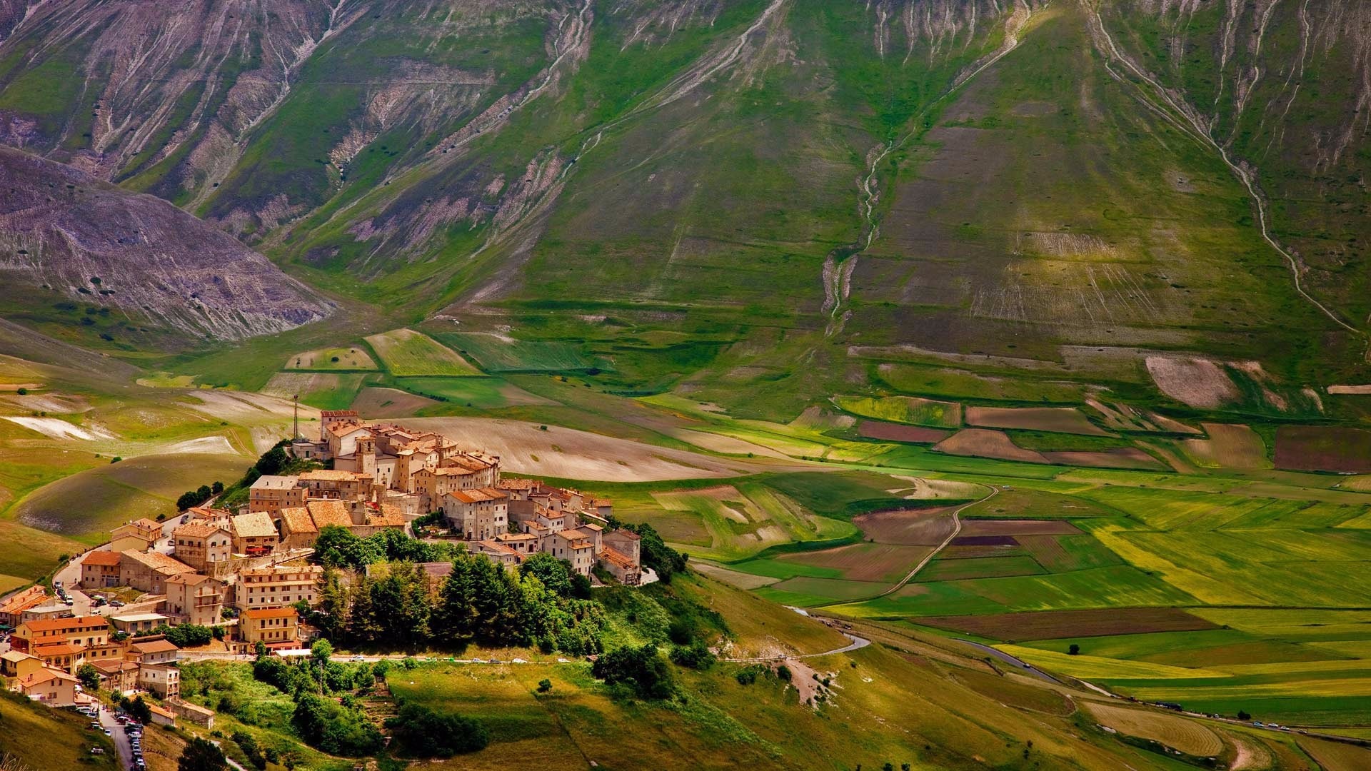 Download mobile wallpaper Italy, Mountain, Field, Village, Valley, Man Made, Castellucio for free.