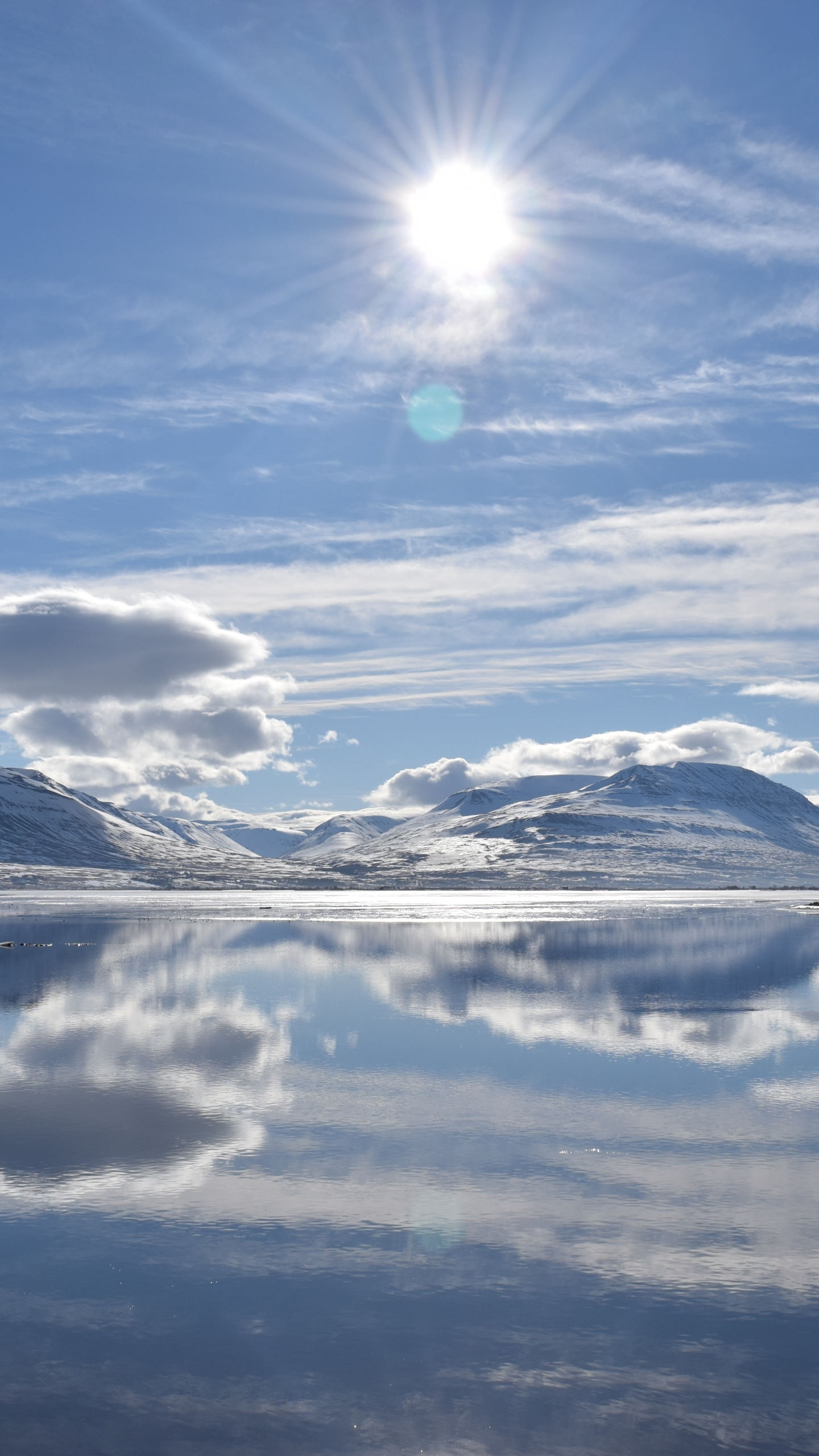 Download mobile wallpaper Landscape, Winter, Water, Sun, Snow, Mountain, Lake, Reflection, Earth, Cloud, Iceland, Sunbeam, Sunbean for free.