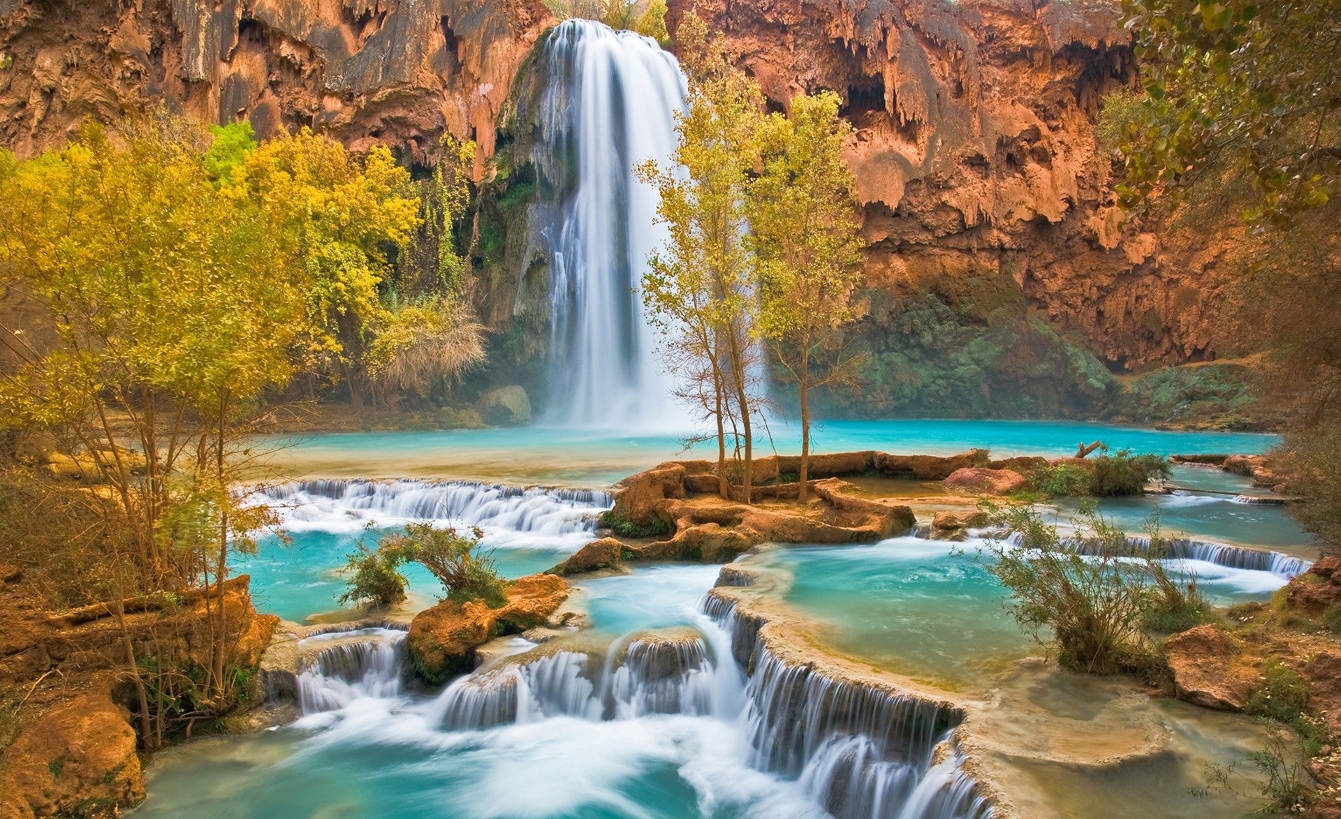 Download mobile wallpaper Nature, Water, Waterfall, Vegetation, Earth for free.