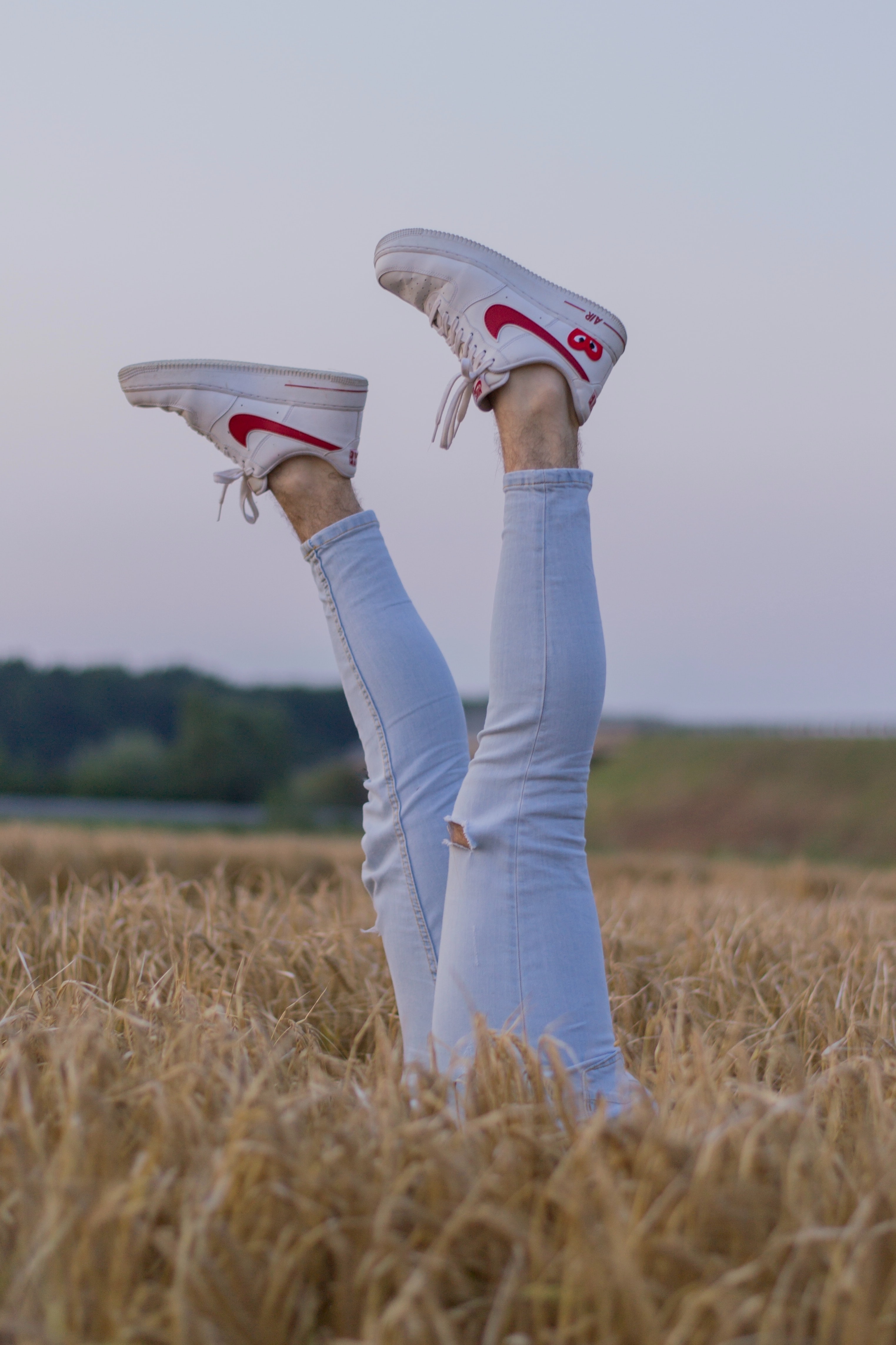 Download mobile wallpaper Ears, Field, Spikes, Miscellaneous, Miscellanea, Legs, Sneakers for free.