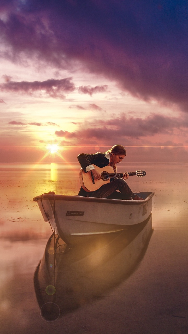 Download mobile wallpaper Music, Sunset, Horizon, Reflection, Ocean, Guitar, Boat, Musician for free.