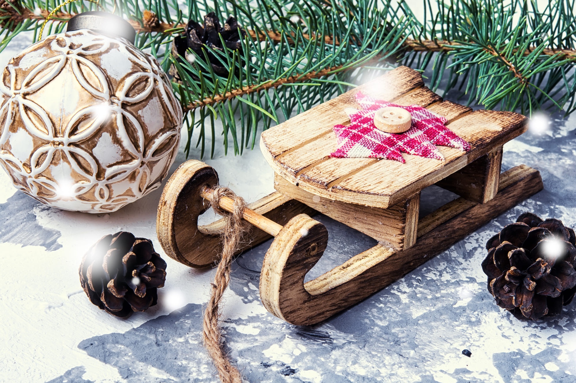 Download mobile wallpaper Christmas, Holiday, Sled, Bauble, Pine Cone for free.