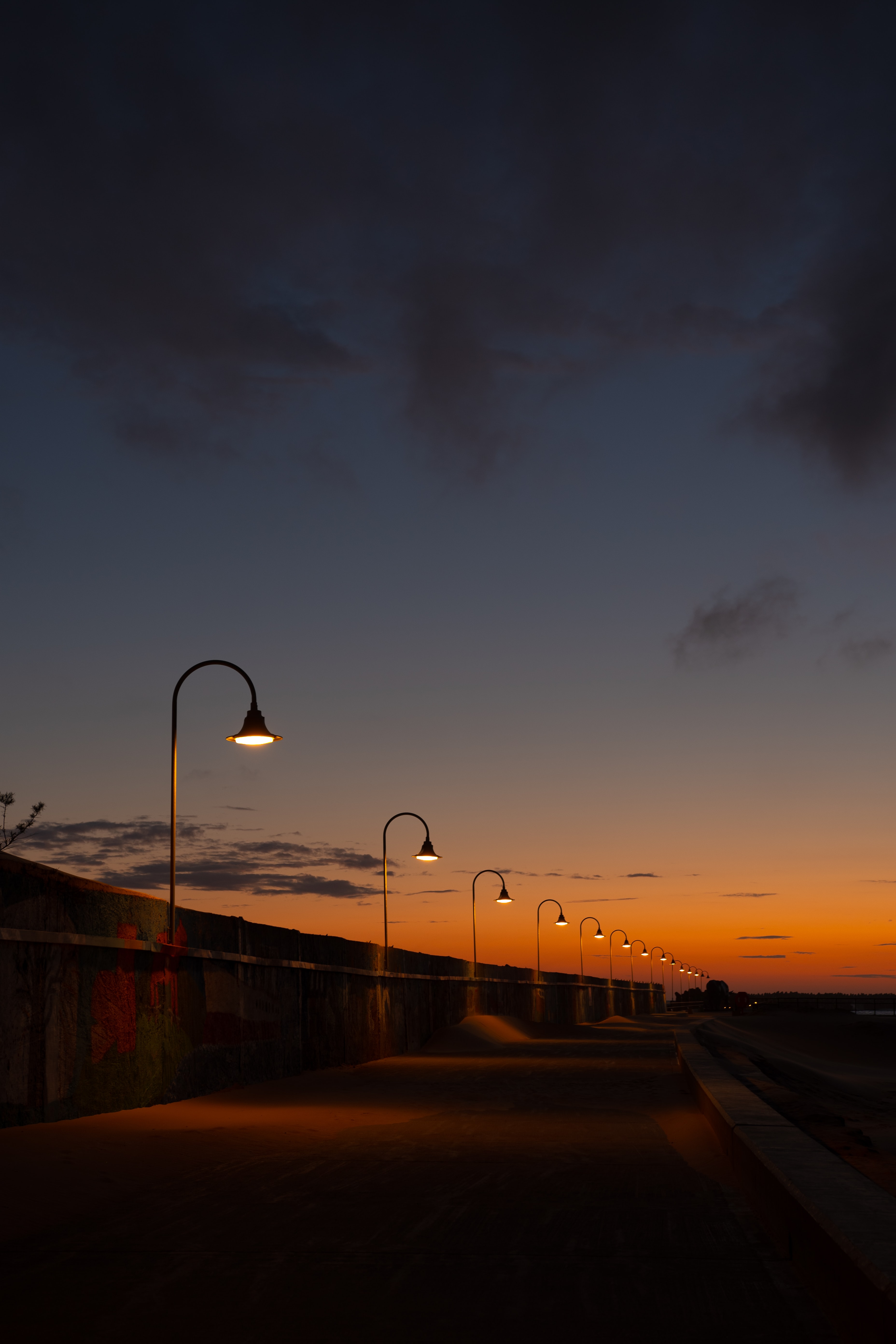 Free download wallpaper Cities, Sunset, Lights, Road, Lanterns, Evening on your PC desktop