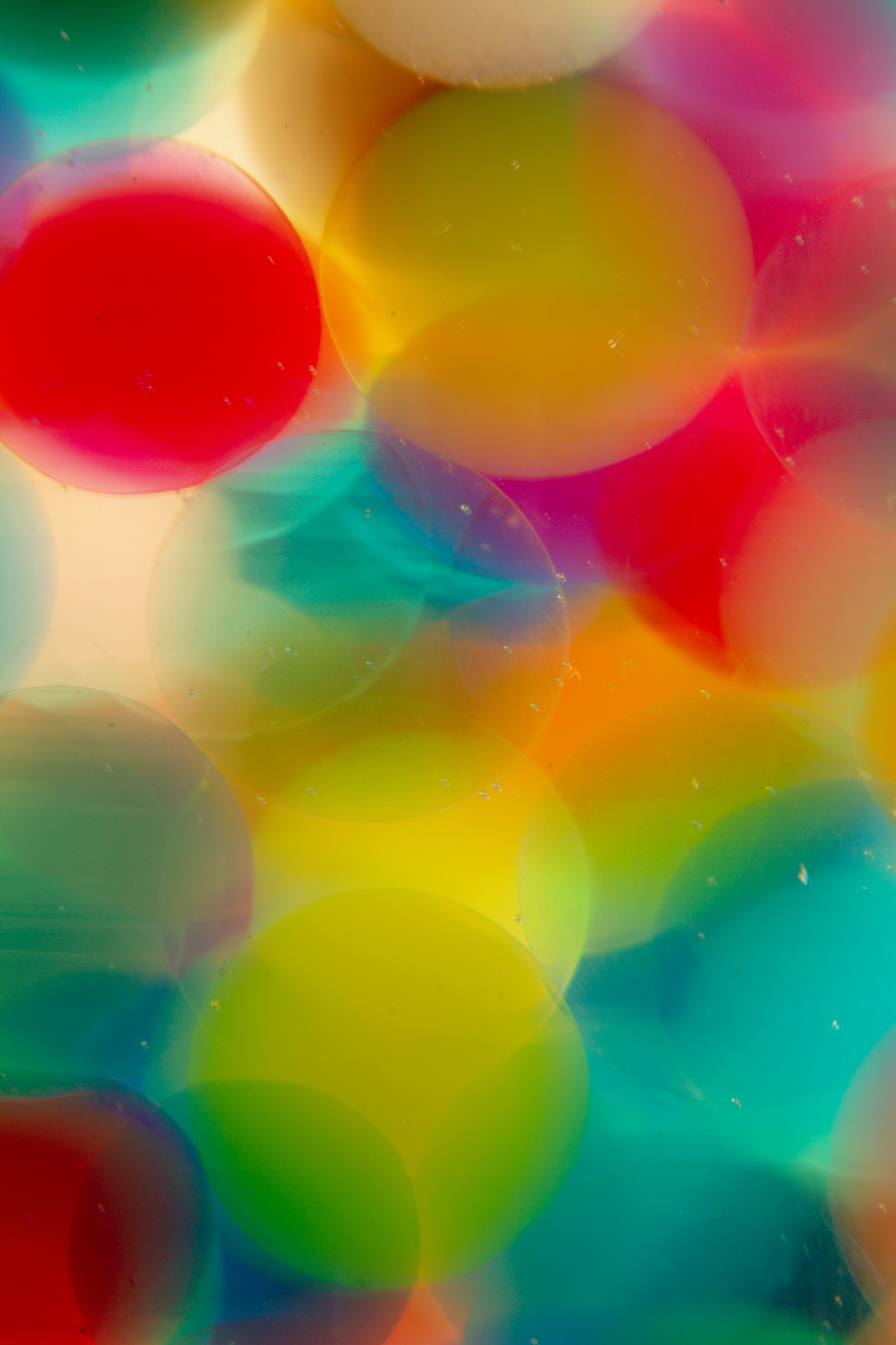 Скачать картинку Жидкость, Абстракция, Разноцветный, Круги, Пузыри в телефон бесплатно.