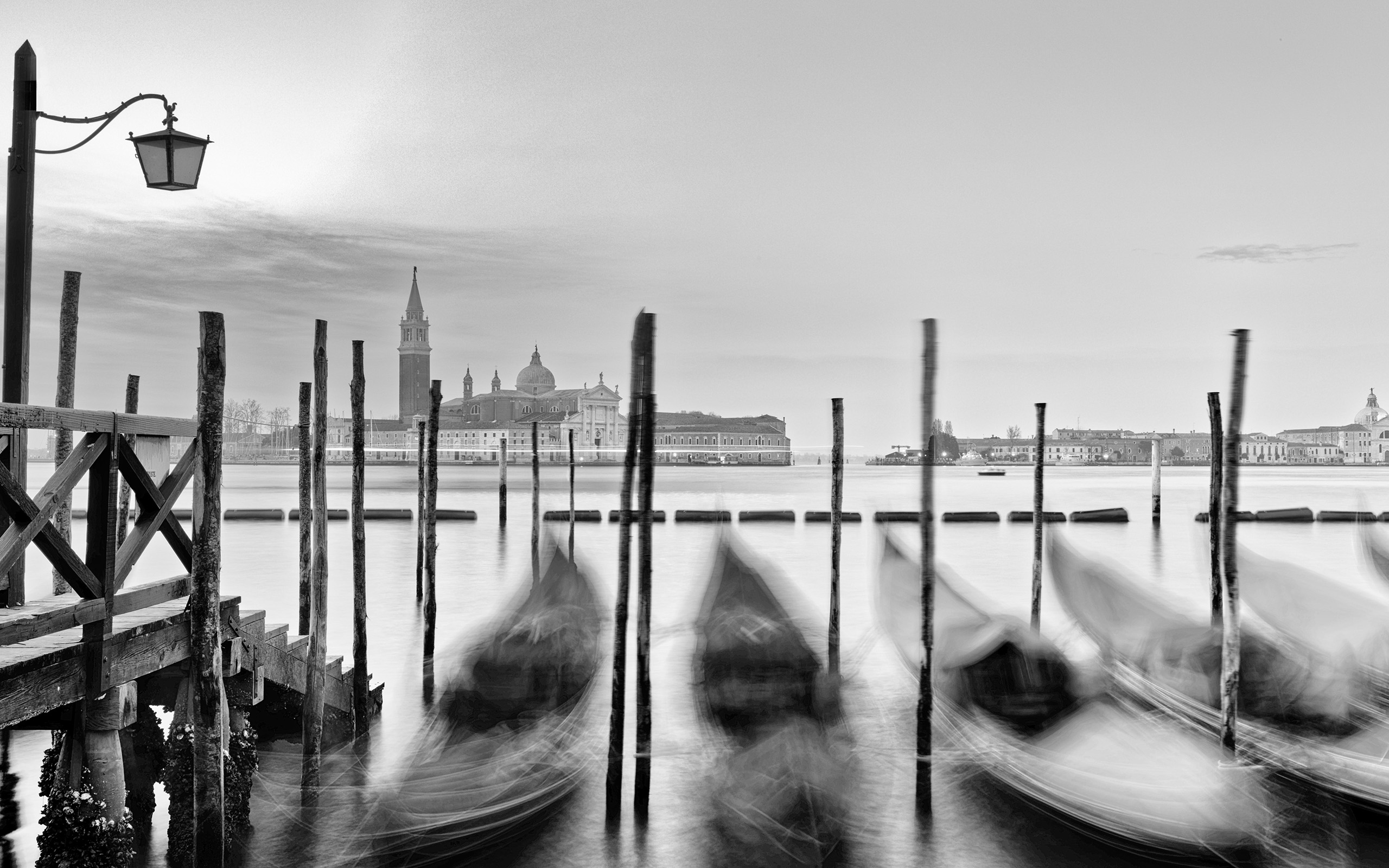 Download mobile wallpaper Cities, Italy, Venice, Blur, Boat, Gondola, Man Made, Black & White, Canal for free.