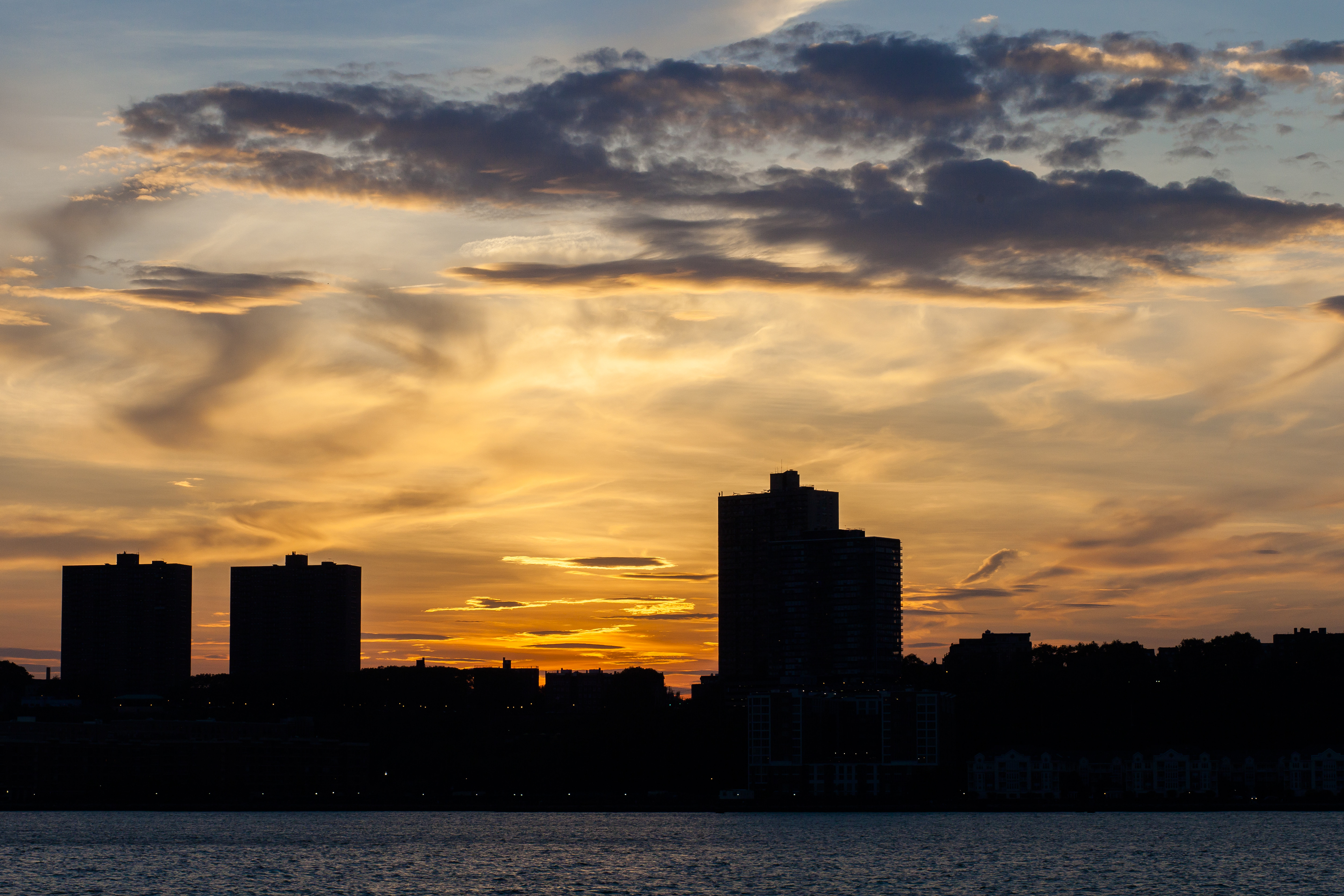 Free download wallpaper Cities, Sunset, Sky, Building, Silhouette, Sea on your PC desktop