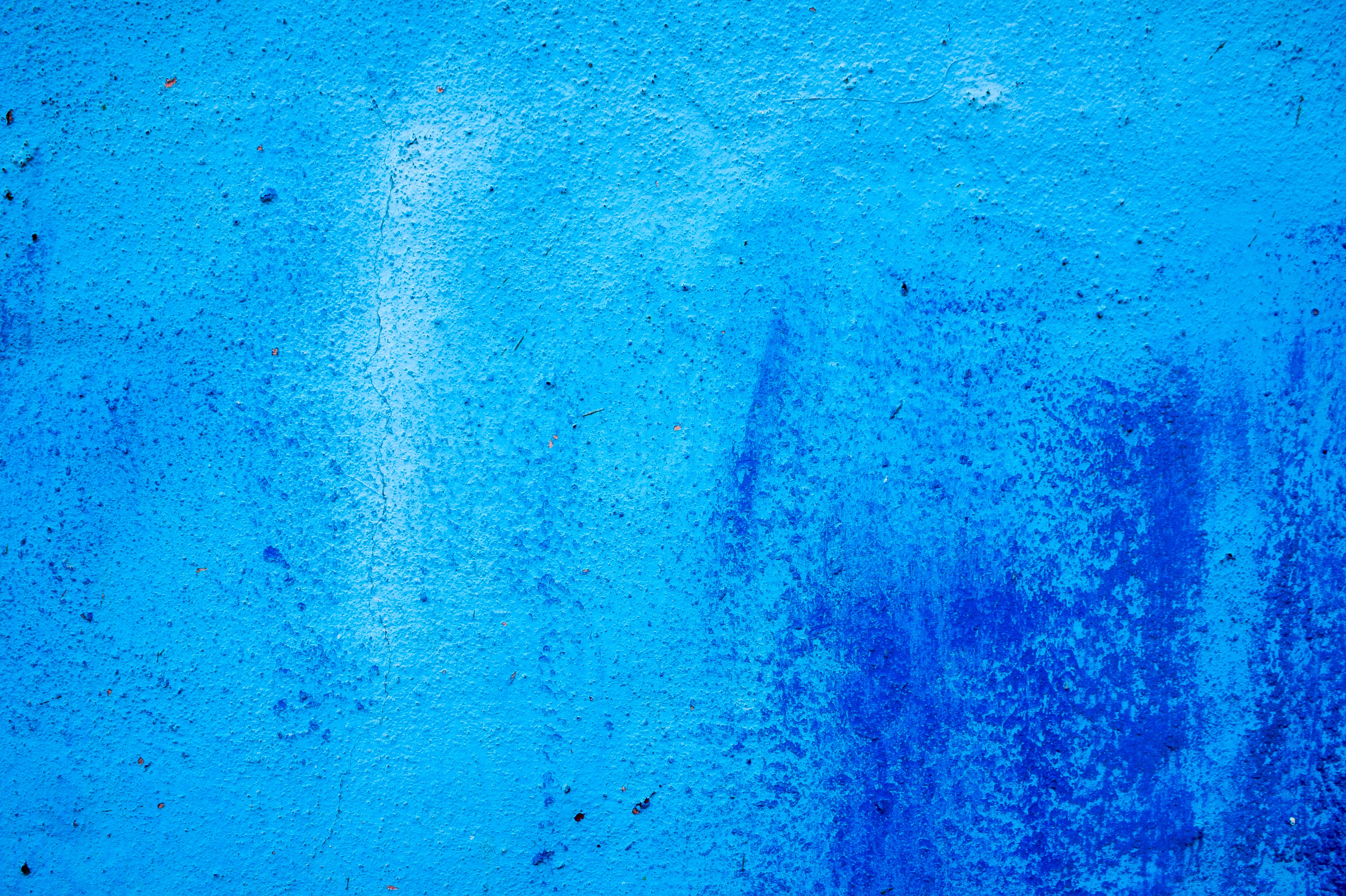 Скачать картинку Краска, Стена, Синий, Пятна, Текстуры в телефон бесплатно.