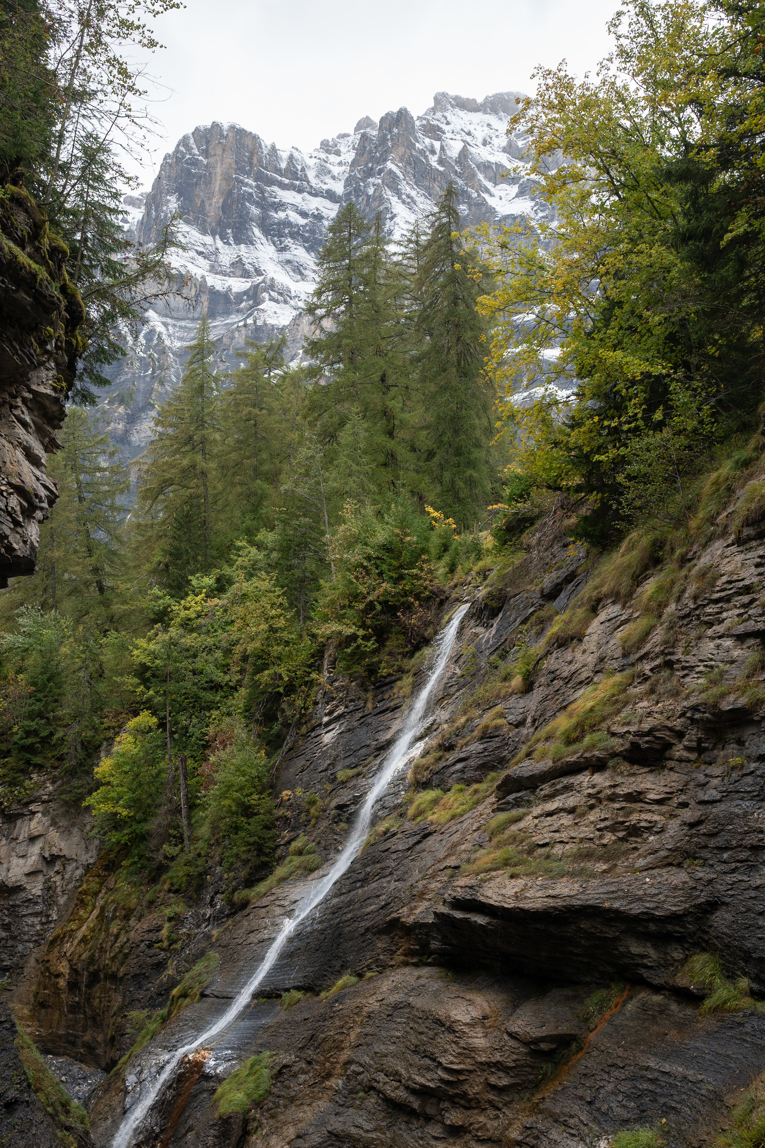 Download mobile wallpaper Trees, Rocks, Waterfall, Mountains, Nature for free.