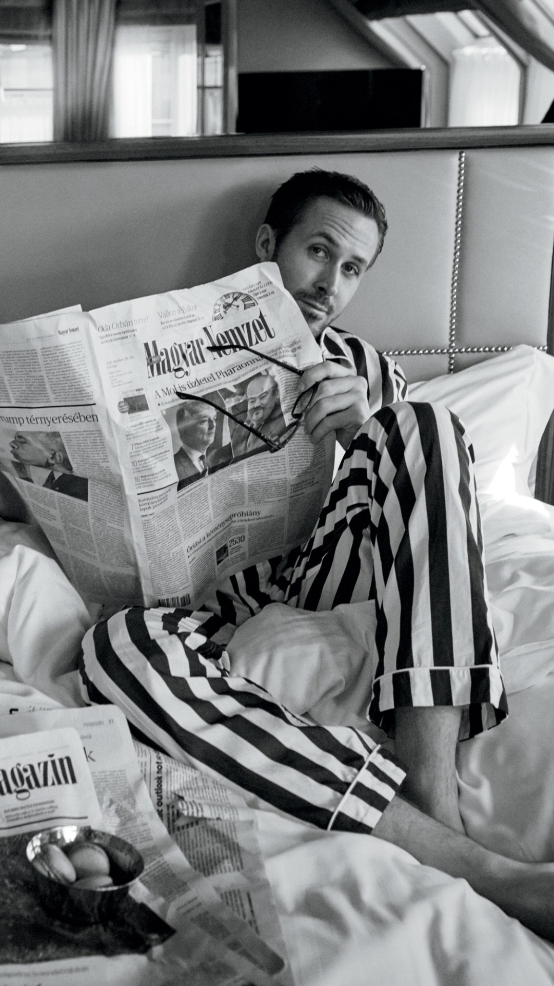Download mobile wallpaper Ryan Gosling, Newspaper, Celebrity, Canadian, Black & White, Actor for free.