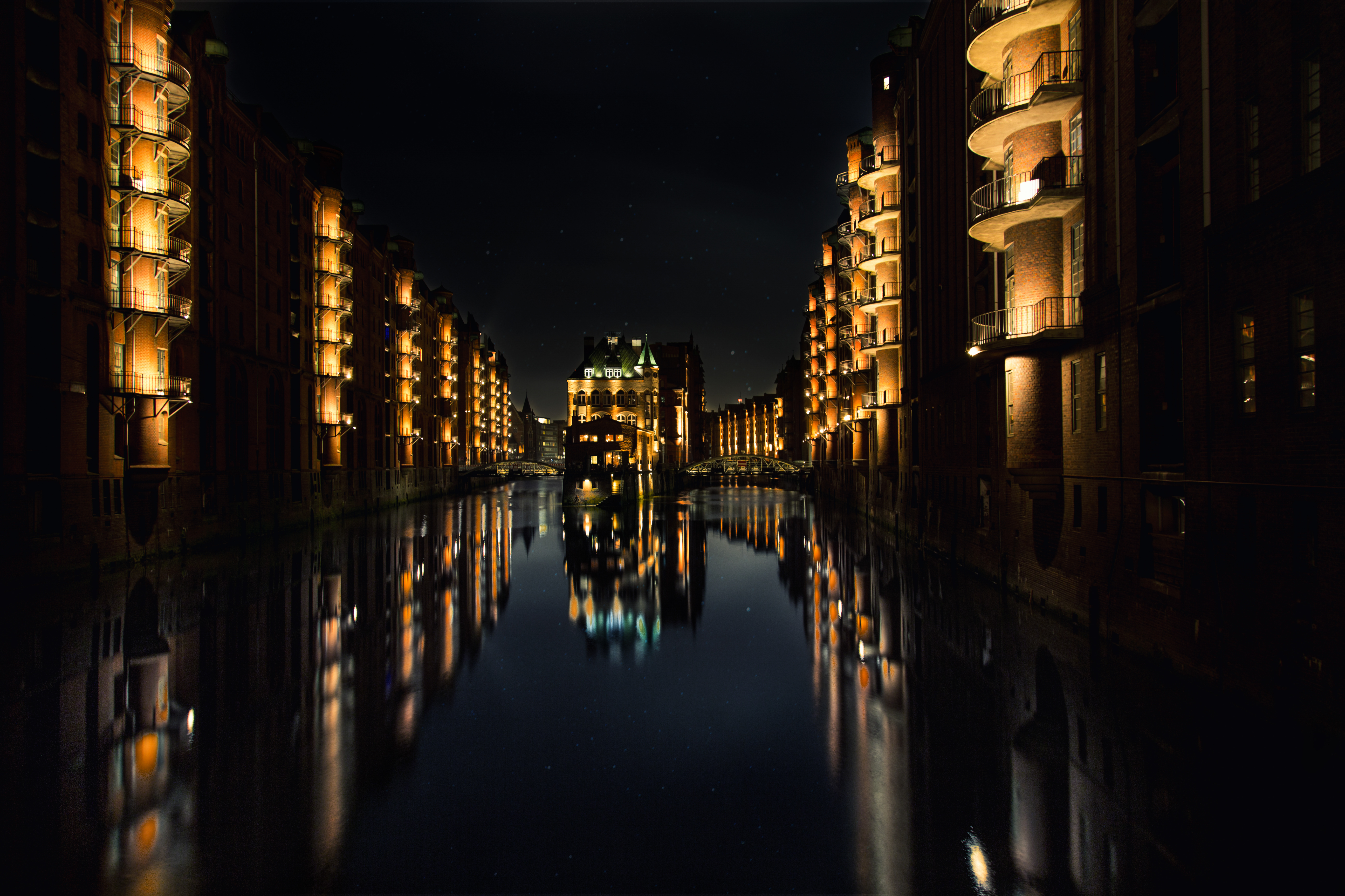 Download mobile wallpaper Night, Building, Reflection, Light, Germany, Hamburg, Man Made, Canal for free.