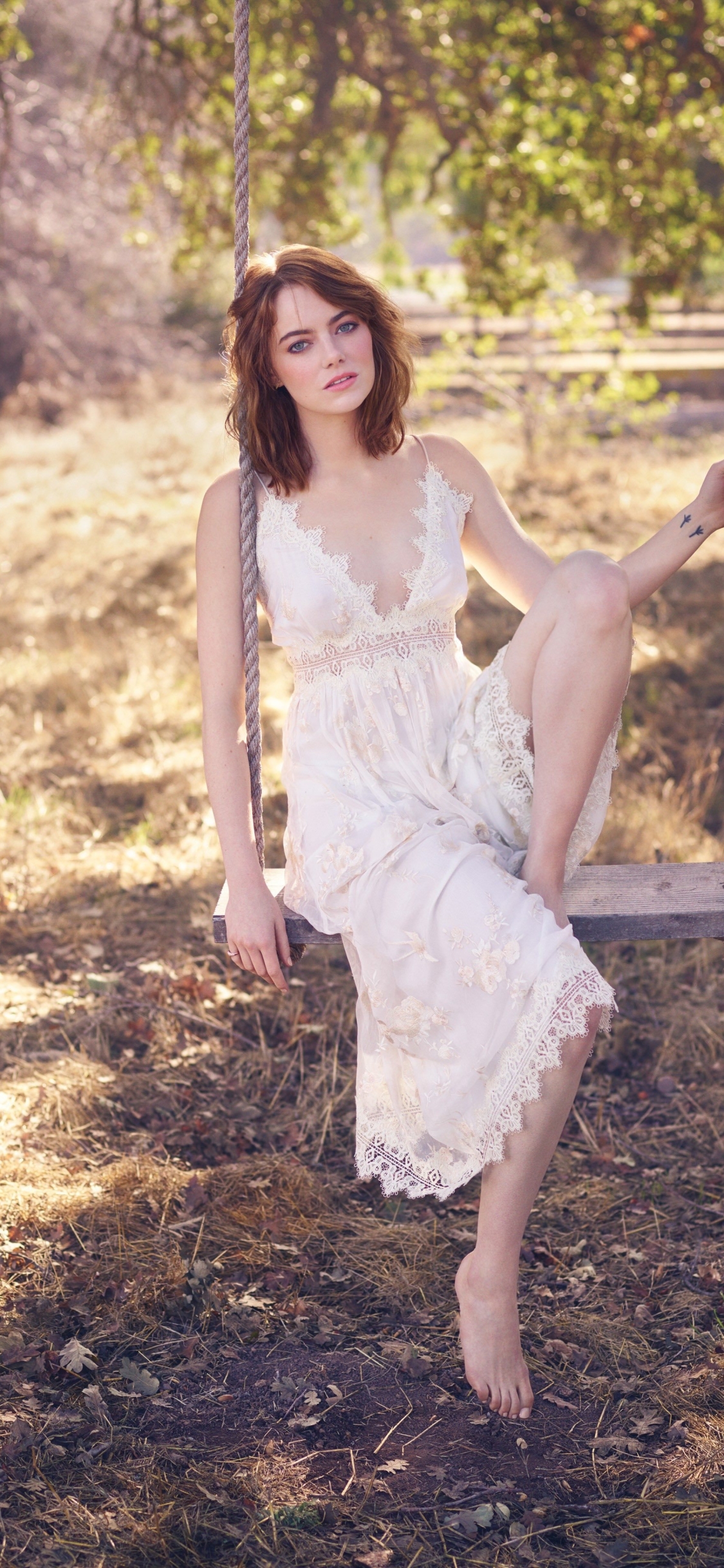 Download mobile wallpaper Emma Stone, Redhead, Swing, Sunny, Celebrity, Actress, Depth Of Field, White Dress for free.