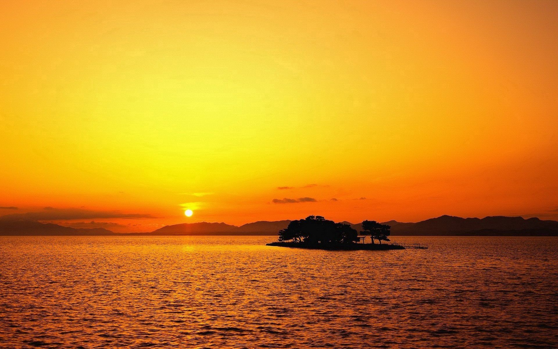 Download mobile wallpaper Islet, Ripples, Ripple, Trees, Horizon, Outlines, Sunset, Sun, Nature, Island, Sea for free.