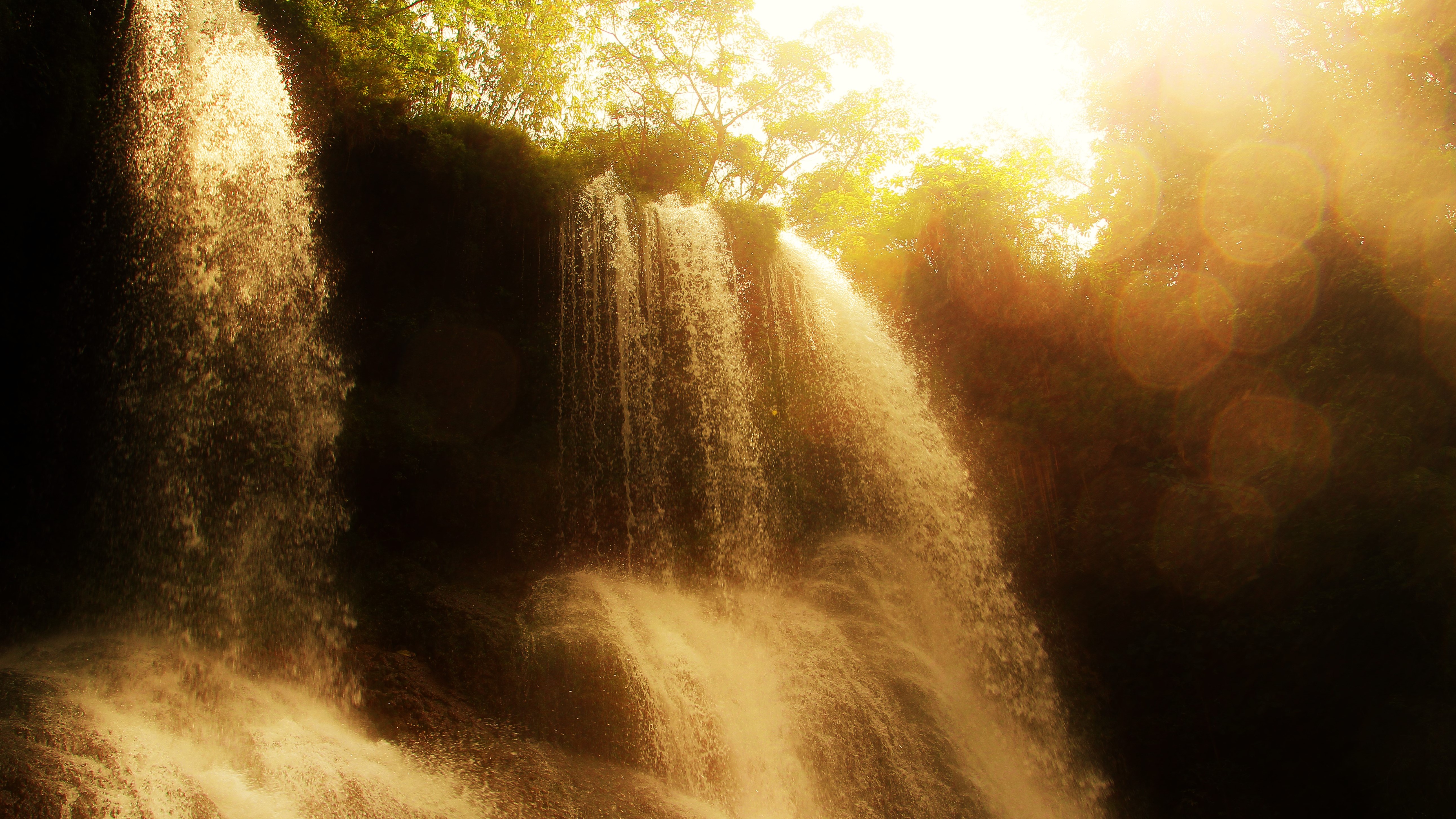 Download mobile wallpaper Nature, Waterfalls, Waterfall, Earth, Golden, Sunshine for free.